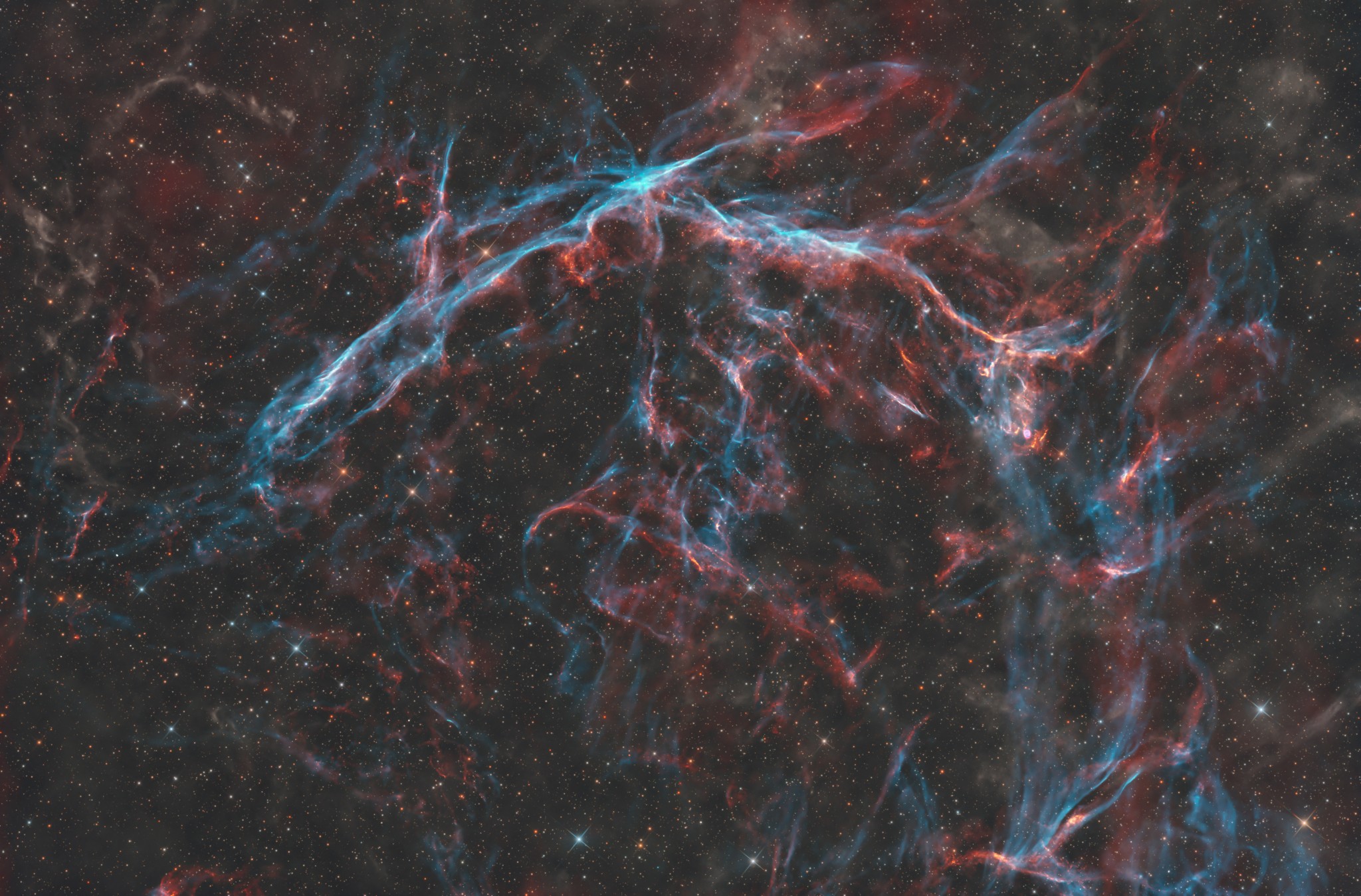 There is a quiet pulsar at the heart of CTA 1. The supernova remnant was discovered as a source of emission at radio wavelengths by astronomers in 1960 and since identified as the result of the death explosion of a massive star. But no radio pulses were detected from the expected pulsar, the rotating neutron star remnant of the massive star's collapsed core. Seen about 10,000 years after the initial supernova explosion, the interstellar debris cloud is faint at optical wavelengths. CTA 1's visible wavelength emission from still expanding shock fronts is revealed in this deep telescopic image, a frame that spans about 2 degrees across a starfield in the northern constellation of Cepheus. While no pulsar has since been found at radio wavelengths, in 2008 the Fermi Gamma-ray Space Telescope detected pulsed emission from CTA 1, identifying the supernova remnant's rotating neutron star. The source has been recognized as the first in a growing class of pulsars that are quiet at radio wavelengths but pulse in high-energy gamma-rays.