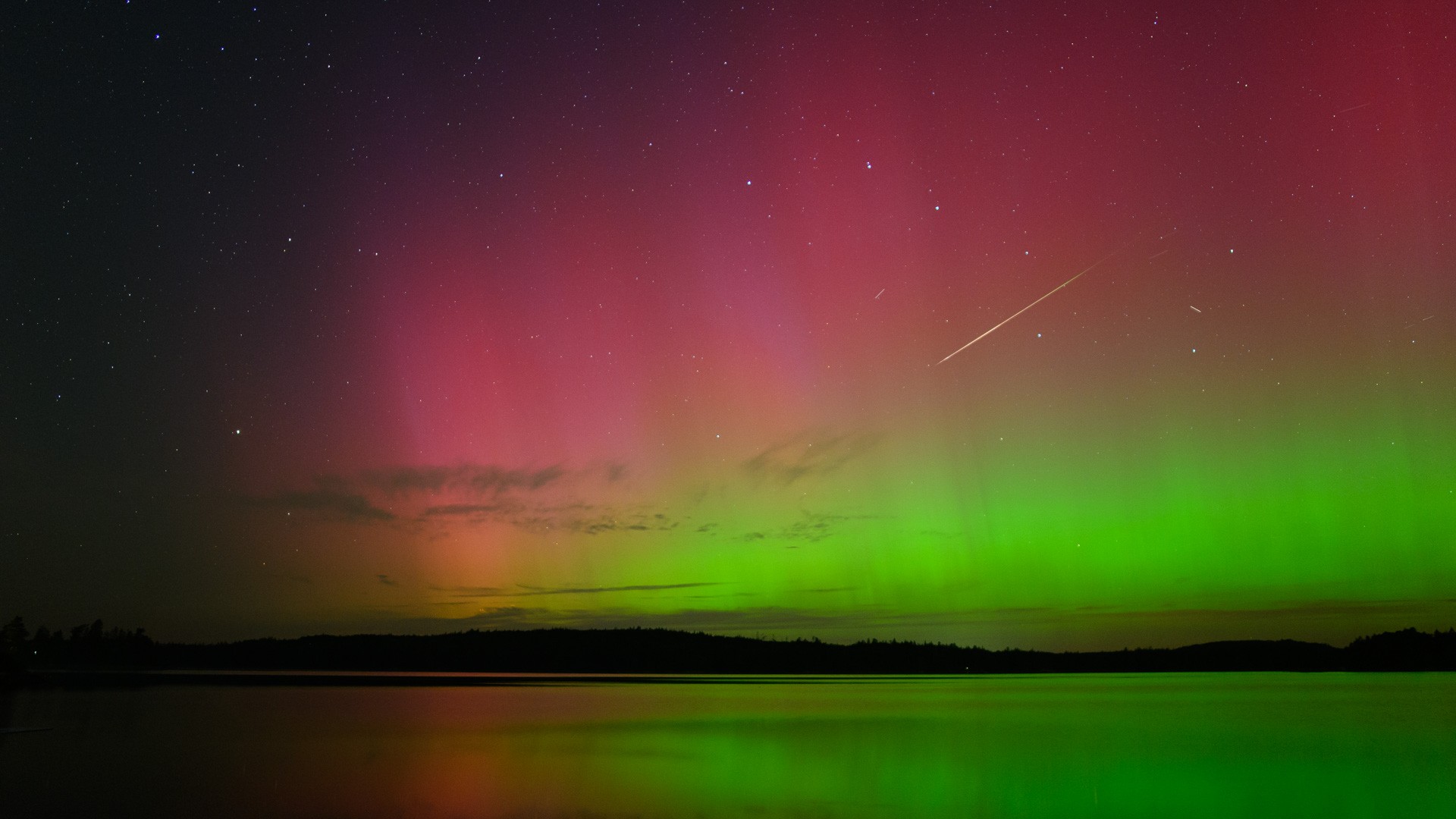 A single exposure made with a camera pointed almost due north on August 12 recorded this bright Perseid meteor in the night sky west of Halifax, Nova Scotia, Canada. The meteor's incandescent trace is fleeting. It appears to cross the stars of the Big Dipper, famous northern asterism and celestial kitchen utensil, while shimmering curtains of aurora borealis, also known as the northern lights, dance in the night. Doubling the wow factor for night skywatchers near the peak of this year's Perseid meteor shower auroral activity on planet Earth was enhanced by geomagnetic storms. The intense space weather was triggered by flares from an active Sun.   Gallery: Perseid Meteor Shower 2024 and Aurorae