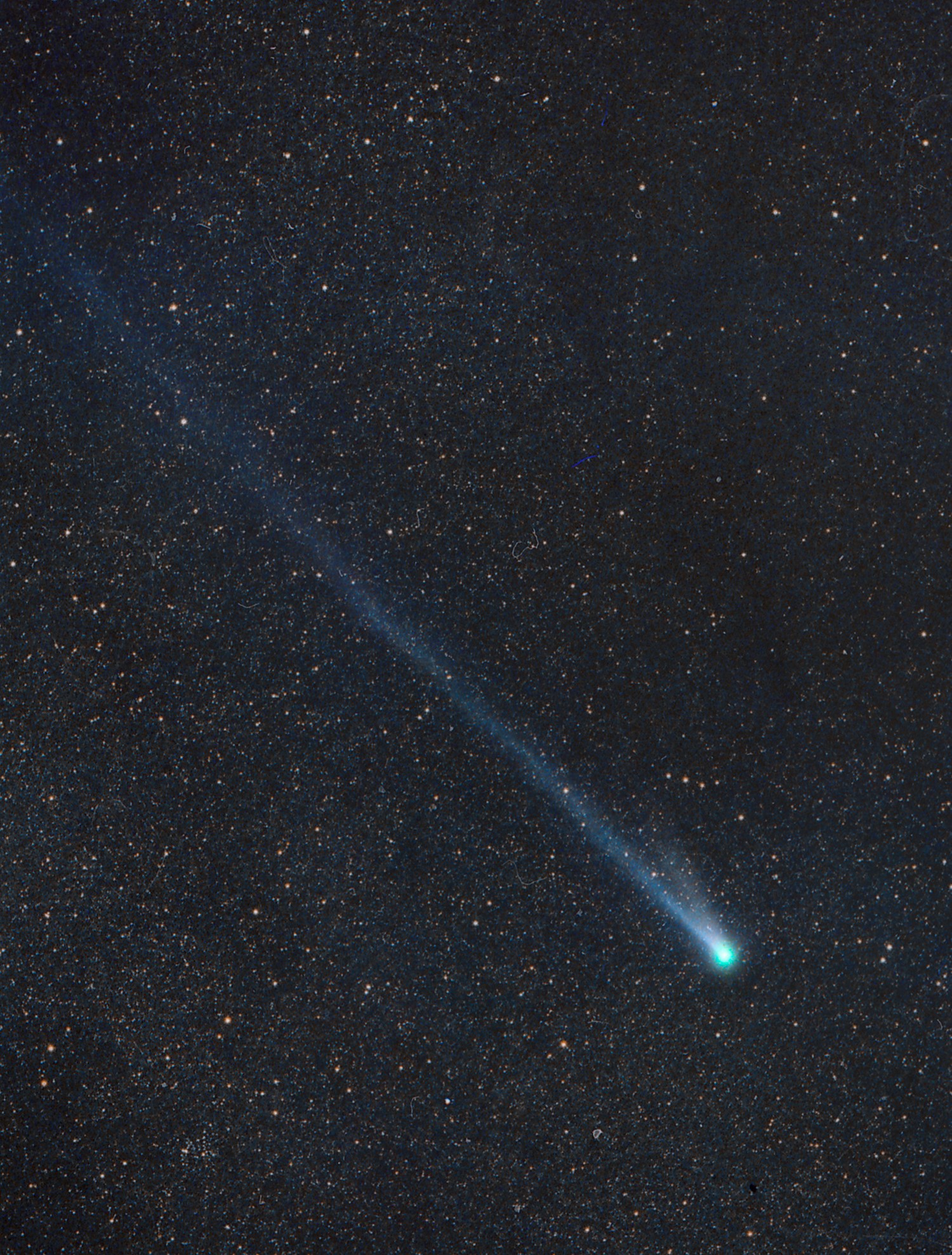 A Halley-type comet with an orbital period of about 133 years, Comet 109P/Swift-Tuttle is recognized as the parent of the annual Perseid Meteor Shower. The comet's last visit to the inner Solar System was in 1992. Then, it did not become easily visible to the naked eye, but it did become bright enough to see from most locations with binoculars and small telescopes. This stunning color image of Swift-Tuttle's greenish coma, long ion tail and dust tail was recorded using film on November 24, 1992. That was about 16 days after the large periodic comet's closest approach to Earth. Comet Swift-Tuttle is expected to next make an impressive appearance in night skies in 2126. Meanwhile, dusty cometary debris left along the orbit of Swift-Tuttle will continue to be swept up creating planet Earth's best-known July and August meteor shower.