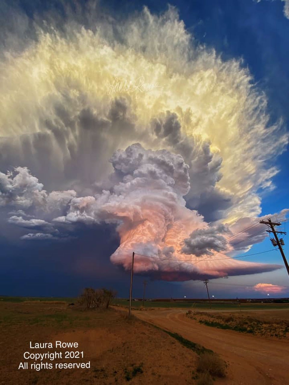 What makes this storm cloud so colorful?  First, the cloud itself is composed of millions of tiny droplets of water and ice.  Its bottom is almost completely flat -- but this isn't unusual.  Bottom flatness in clouds is generally caused by air temperature dropping as you go up, and that above a specific height, water-saturated air condenses out water droplets.  The shape of the cloud middle is caused by a water-droplet-laden column of air being blown upward.  Most unusual, though, are the orange and yellow colors.  Both colors are caused by the cloud's water drops reflecting sunlight. The orange color in the cloud's middle and bottom sections are reflections of a nearly red sunset.  In contrast, the yellow color of the cloud's top results from reflection of light from a not-yet-setting Sun, where some -- but less -- blue light is being scattered away. Appearing to float above the plains in Texas, the featured impressive image of a dynamic cumulonimbus cloud was captured in 2021 while investigating a tornado.