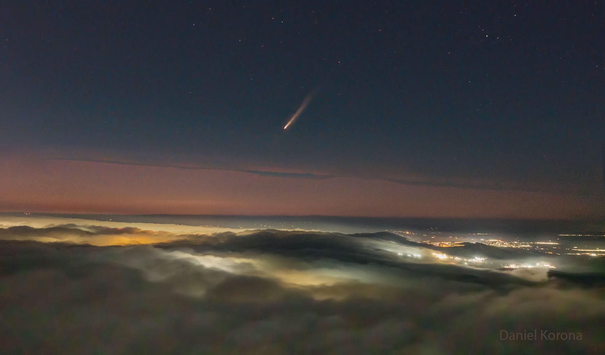 The new comet has passed its closest to the Sun and is now moving closer to the Earth. C/2023 A3 (Tsuchinshan–ATLAS) is currently moving out from inside the orbit of Venus and on track to pass its nearest to the Earth in about two weeks.  Comet Tsuchinshan-ATLAS, pronounced "Choo-cheen-shahn At-less,", is near naked-eye visibility and easily picked up by long-exposure cameras.  The comet can also now be found by observers in Earth's northern hemisphere as well as the south.  The featured image was captured just a few days ago above Zacatecas, Mexico. Because clouds were obscuring much of the pre-dawn sky, the astrophotographer released a drone to take pictures from higher up, several of which were later merged to enhance the comet's visibility. Although the future brightness of comets is hard to predict, there is increasing hope that Comet Tsuchinshan-ATLAS will further brighten as it enters the early evening sky.   Growing Gallery: Comet Tsuchinsan-ATLAS in 2024