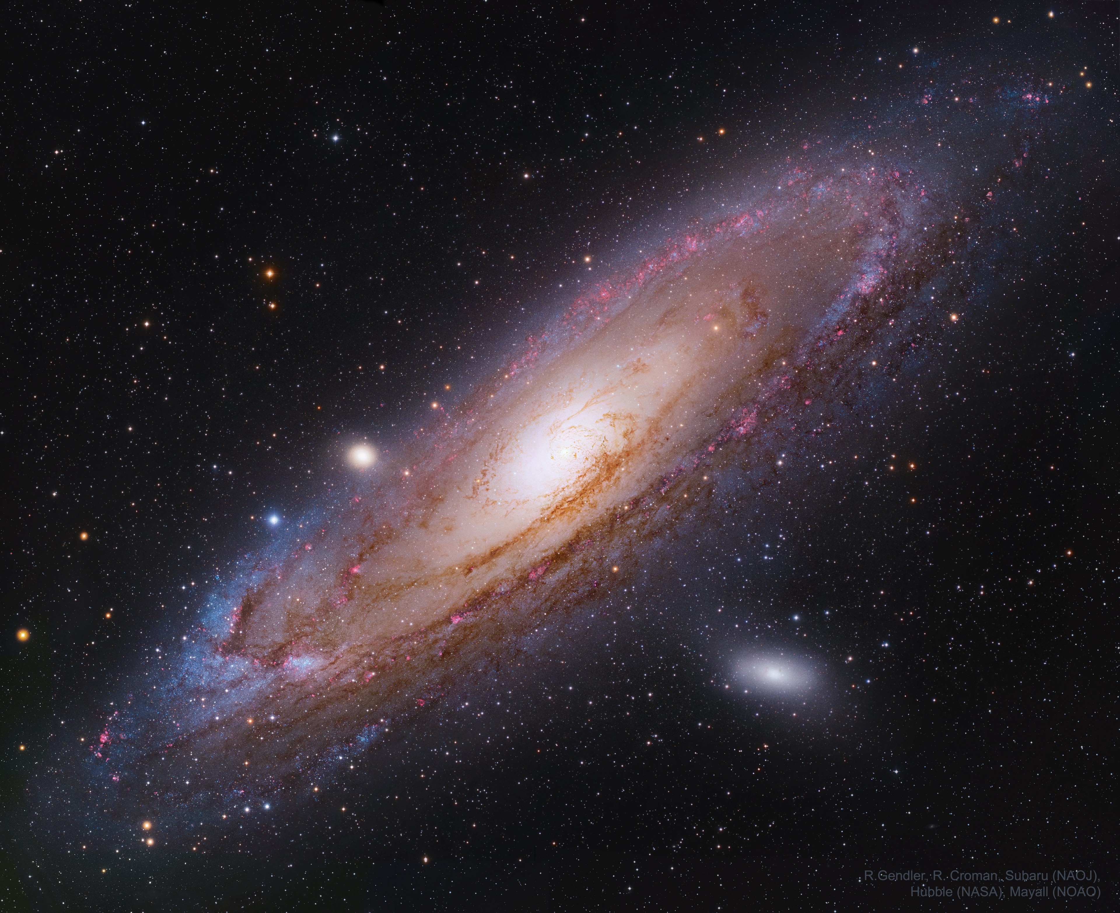 The most distant object easily visible to the unaided eye is M31, the great Andromeda Galaxy. Even at some two and a half million light-years distant, this immense spiral galaxy -- spanning over 200,000 light years -- is visible, although as a faint, nebulous cloud in the constellation Andromeda. A bright yellow nucleus, dark winding dust lanes, and expansive spiral arms dotted with blue star clusters and red nebulae, are recorded in this stunning telescopic image which combines data from orbiting Hubble with ground-based images from Subaru and Mayall. In only about 5 billion years, the Andromeda galaxy may be even easier to see -- as it will likely span the entire night sky -- just before it merges with, or passes right by, our Milky Way Galaxy.   Teachers & Students: Ideas for using APOD in the classroom