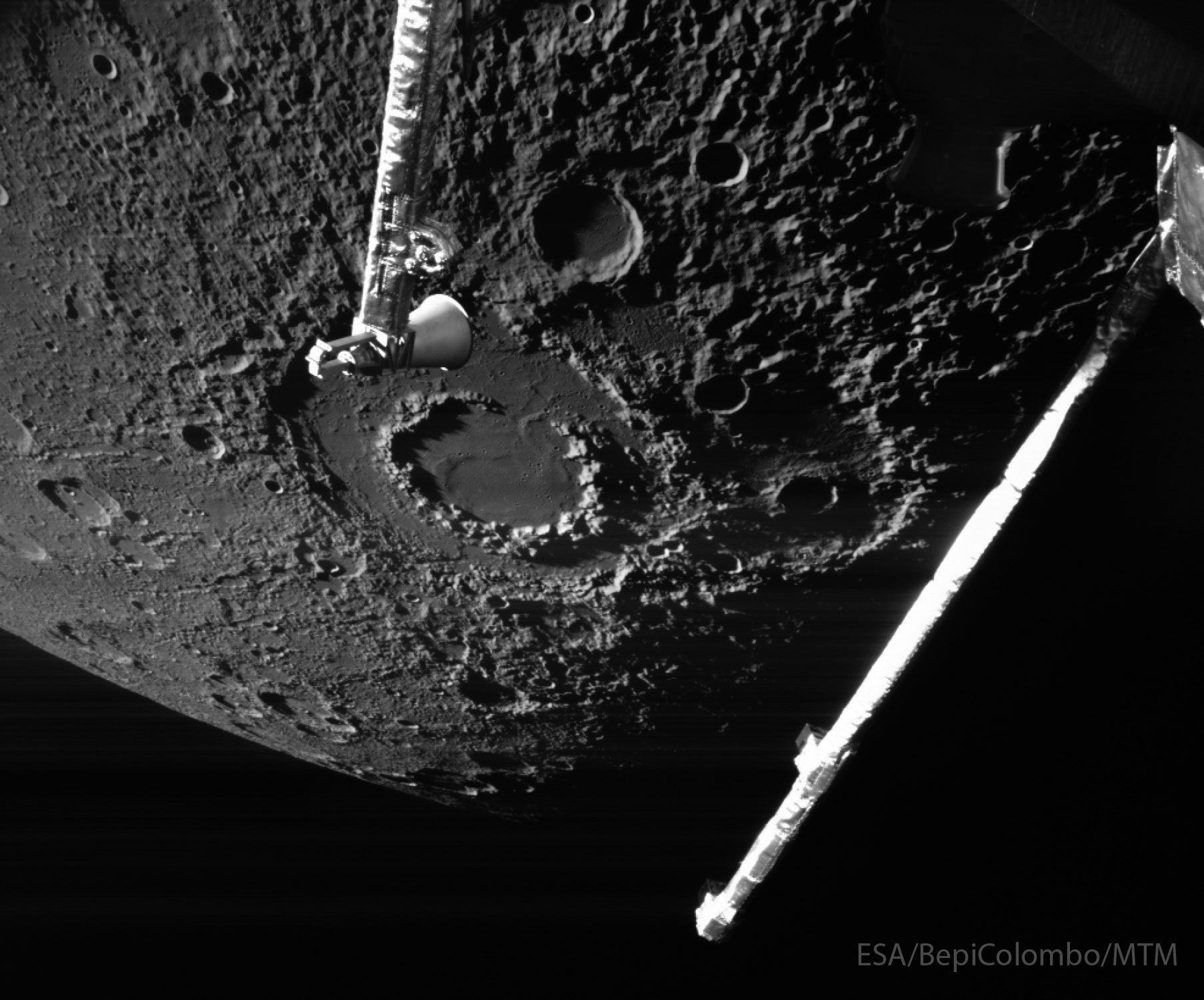 Why does this large crater on Mercury have two rings and a smooth floor?  No one is sure.  The unusual feature called Vivaldi Crater spans 215 kilometers and was imaged again in great detail by ESA's and JAXA's robotic BepiColombo spacecraft on a flyby earlier this month. A large circular feature on a rocky planet or moon is usually caused by either an impact by a small asteroid or a comet fragment, or a volcanic eruption. In the case of Vivaldi, it is possible that both occurred -- a heavy strike that caused a smooth internal lava flow.  Double-ringed craters are rare, and the cause of the inner rings remains a topic of research.  The speed-slowing gravity-assisted flyby of Mercury by BepiColombo was in preparation for the spacecraft entering orbit around the Solar System's innermost planet in 2026.