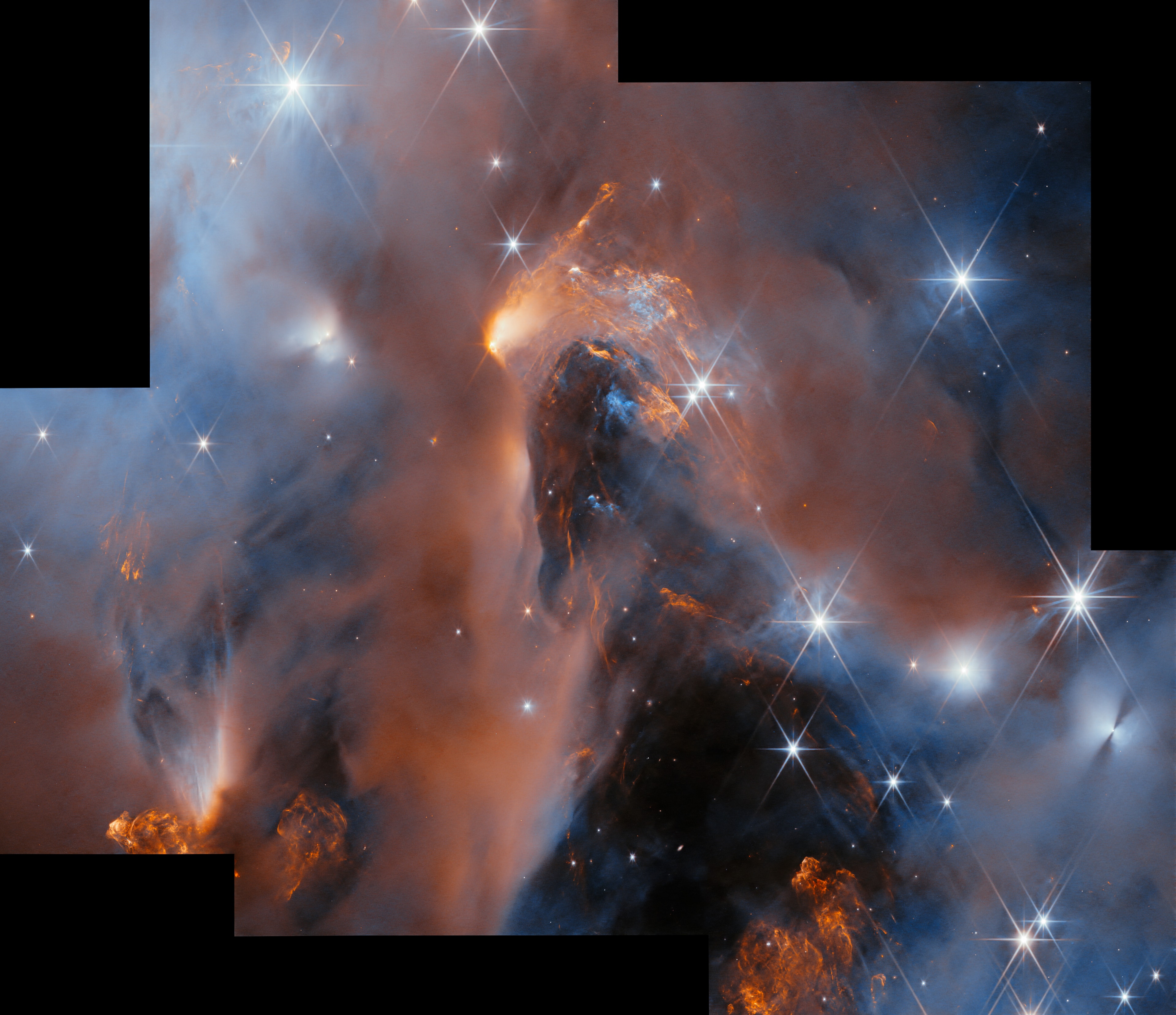 This spectacular mosaic of images from the James Webb Space Telescope peers into the heart of young star cluster NGC 1333. A mere 1,000 light-years distant toward the heroic constellation Perseus, the nearby star cluster lies at the edge of the large Perseus molecular cloud. Part of Webb's deep exploration of the region to identify low mass brown dwarf stars and free floating planets, the space telescope's combined field of view spans nearly 2 light-years across the dusty cluster's turbulent stellar nursery. In fact, NGC 1333 is known to harbor stars less than a million years old, though most are hidden from optical telescopes by the pervasive stardust. The chaotic environment may be similar to one in which our own Sun formed over 4.5 billion years ago.