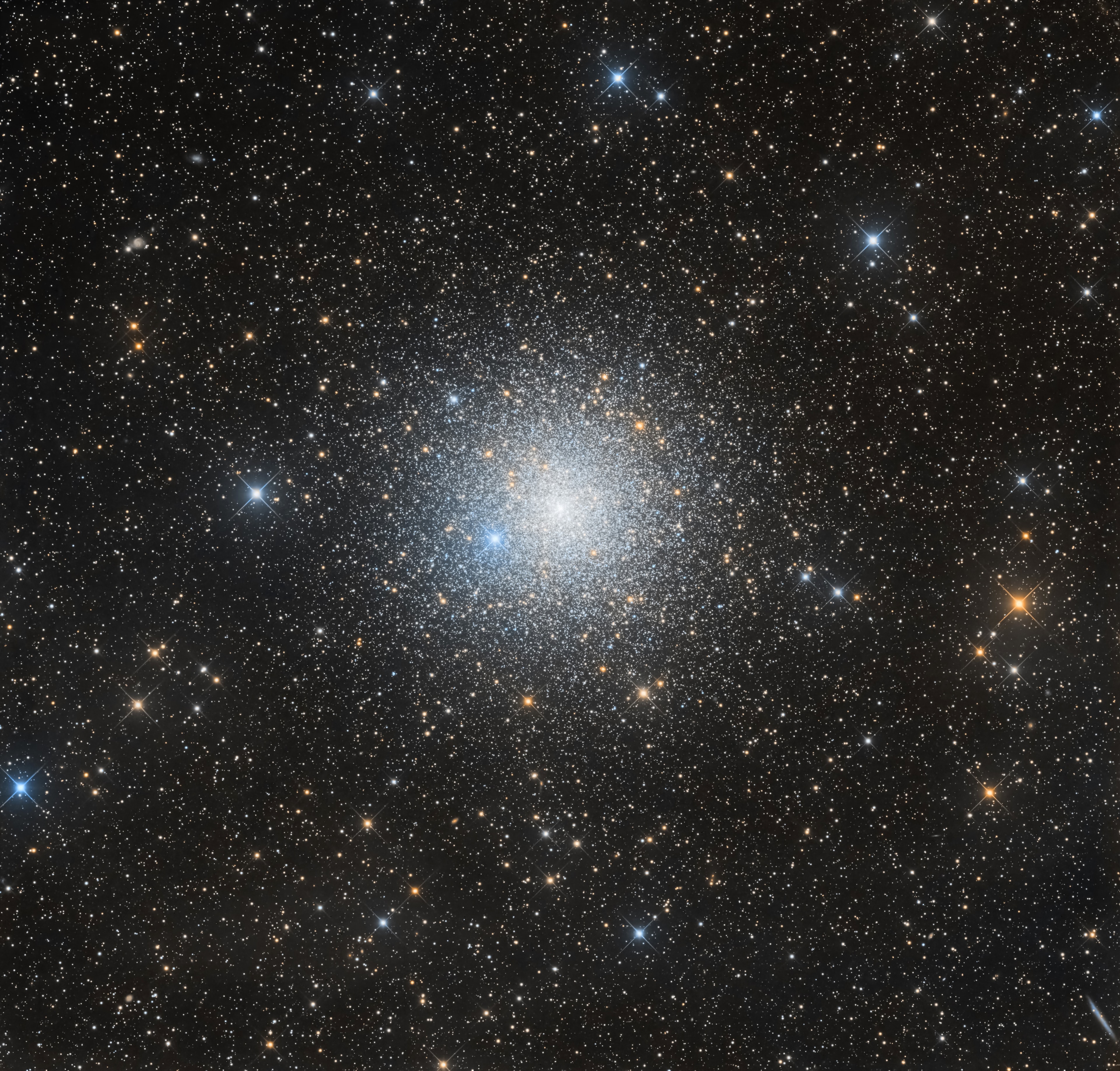Some 13,000 light-years away toward the southern constellation Pavo, the globular star cluster NGC 6752 roams the halo of our Milky Way galaxy. Over 10 billion years old, NGC 6752 follows clusters Omega Centauri, 47 Tucanae, and Messier 22 as the fourth brightest globular in planet Earth's night sky. It holds over 100 thousand stars in a sphere about 100 light-years in diameter. Telescopic explorations of NGC 6752 have found that a remarkable fraction of the stars near the cluster's core are multiple star systems. They also reveal the presence of blue straggle stars, stars which appear to be too young and massive to exist in a cluster whose stars are all expected to be at least twice as old as the Sun. The blue stragglers are thought to be formed by star mergers and collisions in the dense stellar environment at the cluster's core. This sharp color composite also features the cluster's ancient red giant stars in yellowish hues. (Note: The bright, spiky blue star about 8 o'clock from the cluster center is a foreground star along the line-of-sight to NGC 6752)