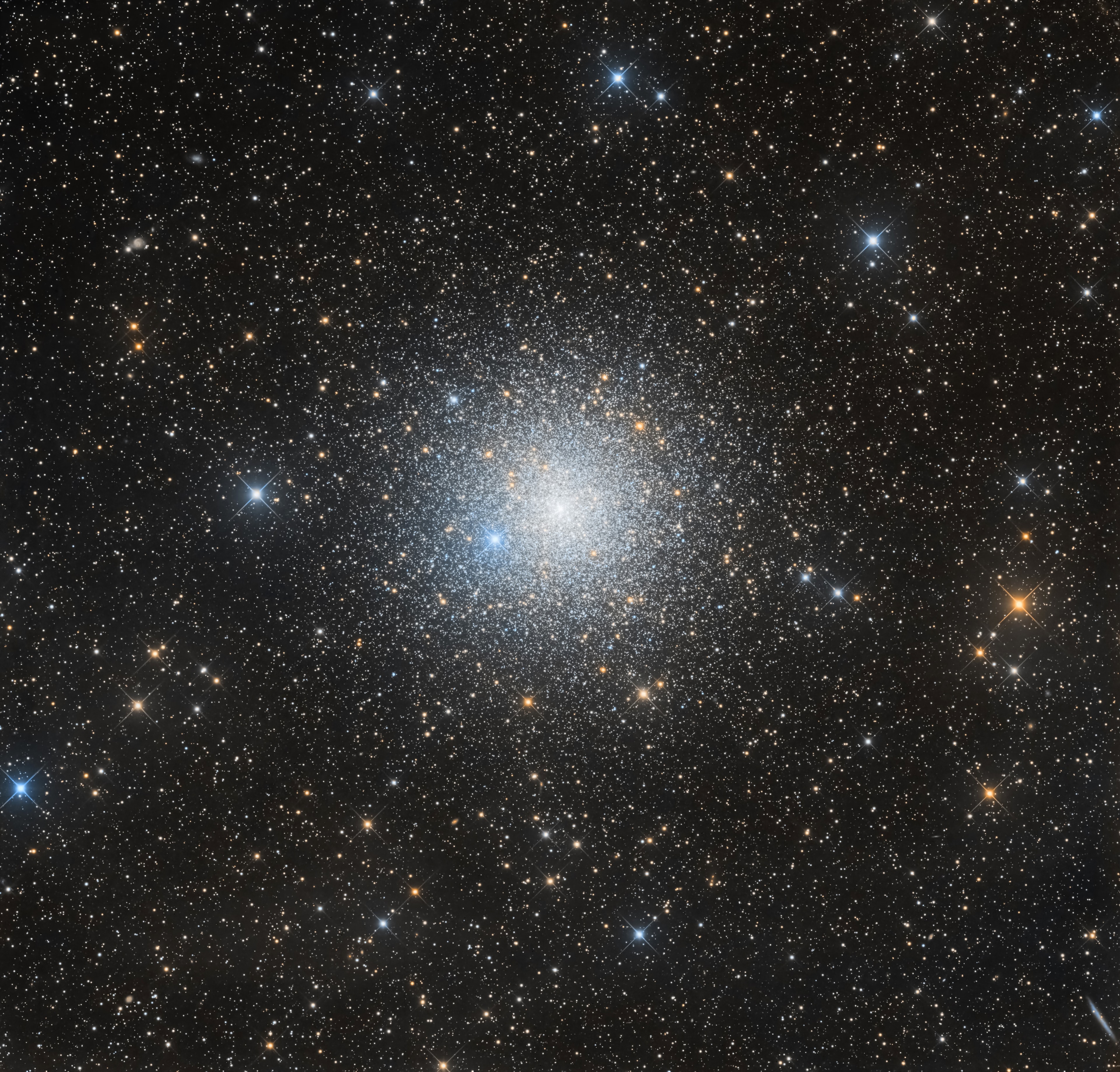 Some 13,000 light-years away toward the southern constellation Pavo, the globular star cluster NGC 6752 roams the halo of our Milky Way galaxy. Over 10 billion years old, NGC 6752 follows clusters Omega Centauri, 47 Tucanae, and Messier 22 as the fourth brightest globular in planet Earth's night sky. It holds over 100 thousand stars in a sphere about 100 light-years in diameter. Telescopic explorations of NGC 6752 have found that a remarkable fraction of the stars near the cluster's core, are multiple star systems. They also reveal the presence of blue straggle stars, stars which appear to be too young and massive to exist in a cluster whose stars are all expected to be at least twice as old as the Sun. The blue stragglers are thought to be formed by star mergers and collisions in the dense stellar environment at the cluster's core. This sharp color composite also features the cluster's ancient red giant stars in yellowish hues. (Note: The bright, spiky blue star about 8 o'clock from the cluster center is a foreground star along the line-of-sight to NGC 6752)