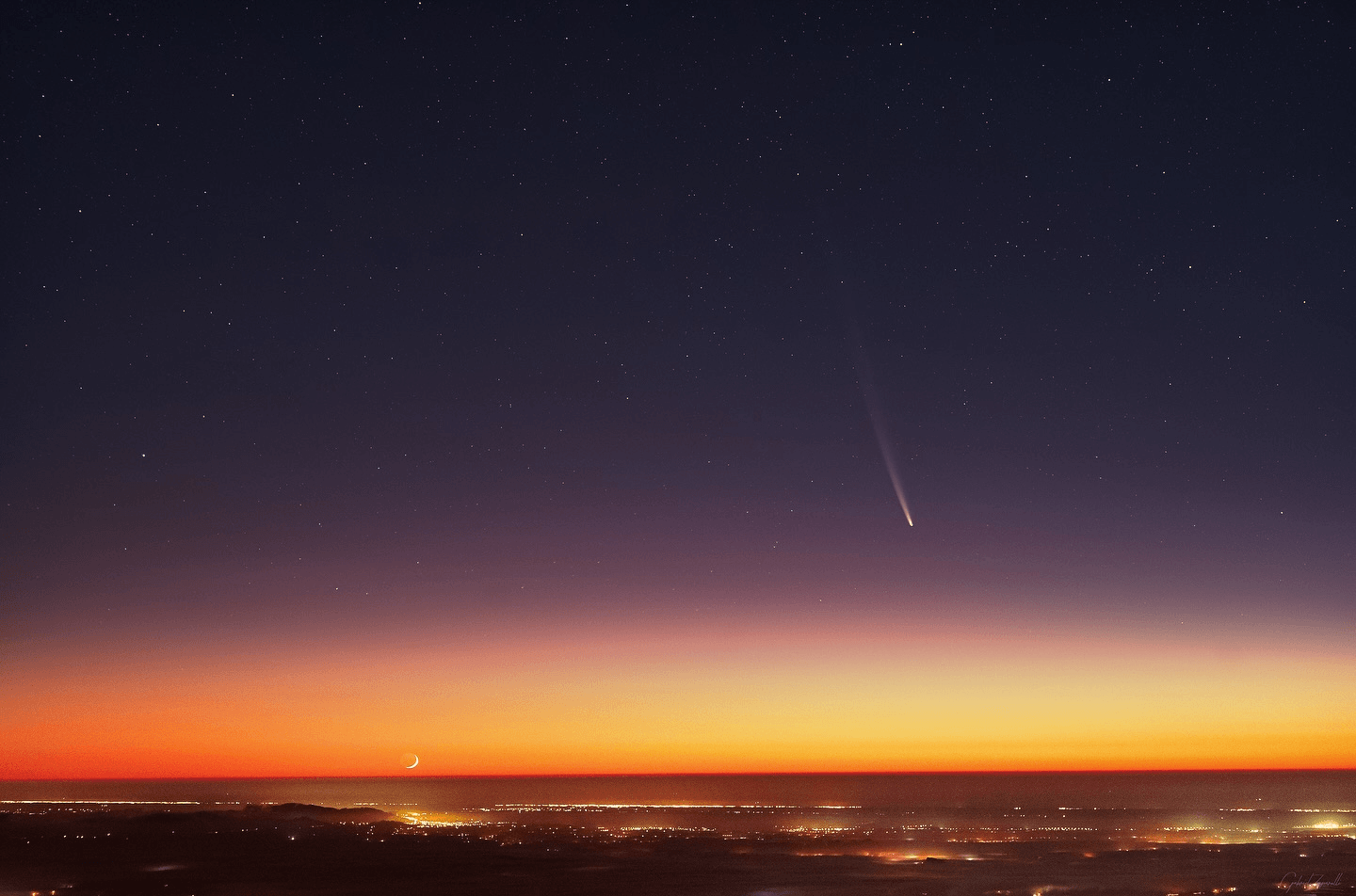 Comet C/2023 A3 (Tsuchinshan–ATLAS) is growing brighter in planet Earth's sky. Fondly known as comet A3, this new visitor to the inner Solar System is traveling from the distant Oort cloud. The comet reached perihelion, its closest approach to the Sun, on September 27 and will reach perigee, its closest to our fair planet, on October 12, by then becoming an evening sky apparition. But comet A3 was an early morning riser on September 30 when this image was made. Its bright coma and already long tail share a pre-dawn skyscape from Praia Grande, Santa Catarina in southern Brazil with the waning crescent Moon just peeking above the eastern horizon. While the behaviour of comets is notoriously unpredictable, Tsuchinshan–ATLAS could become a comet visually rivaling C/2020 F3 (NEOWISE). Comet NEOWISE wowed skygazers in the summer of 2020.   Growing Gallery: Comet Tsuchinsan-ATLAS in 2024