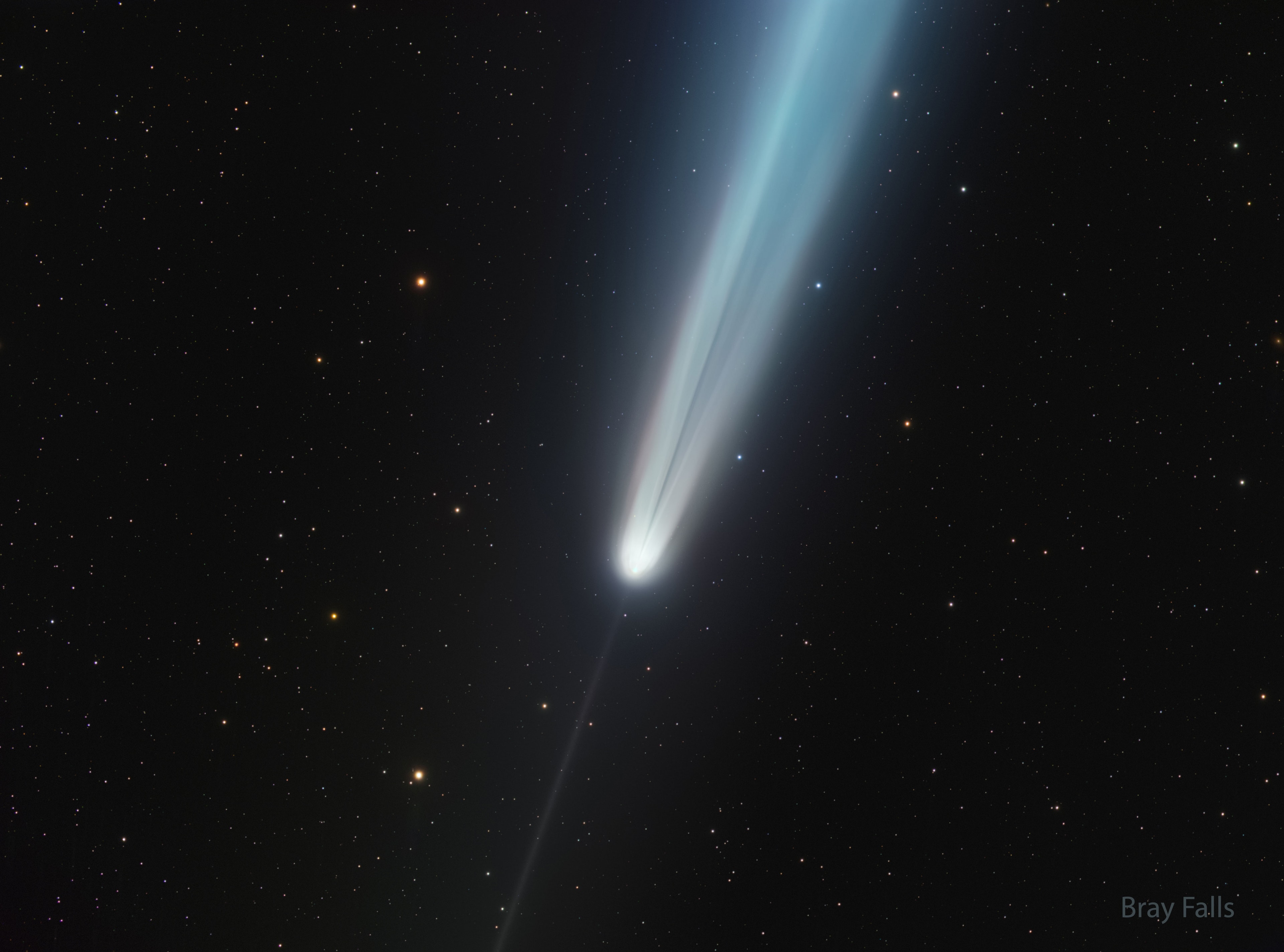 What created an unusual dark streak in Comet Tsuchinshan-Atlas's tail? Some images of the bright comet during mid-October not only caught its impressively long tail and its thin anti-tail, but a rather unexpected feature: a dark streak in the long tail. The reason for the dark streak is currently unclear and a topic of some debate.  Possible reasons include a plume of dark dust, different parts of the bright tail being unusually superposed, and a shadow of a dense part of the coma on smaller dust particles. The streak is visible in the featured image taken on October 14 from Texas, USA. To help future analyses, if you have taken a good image of the comet that clearly shows this dark streak, please send it in to APOD. Comet Tsuchinshan–ATLAS has now faded considerably and is returning to the outer Solar System.   Gallery: Comet Tsuchinshan-ATLAS in 2024