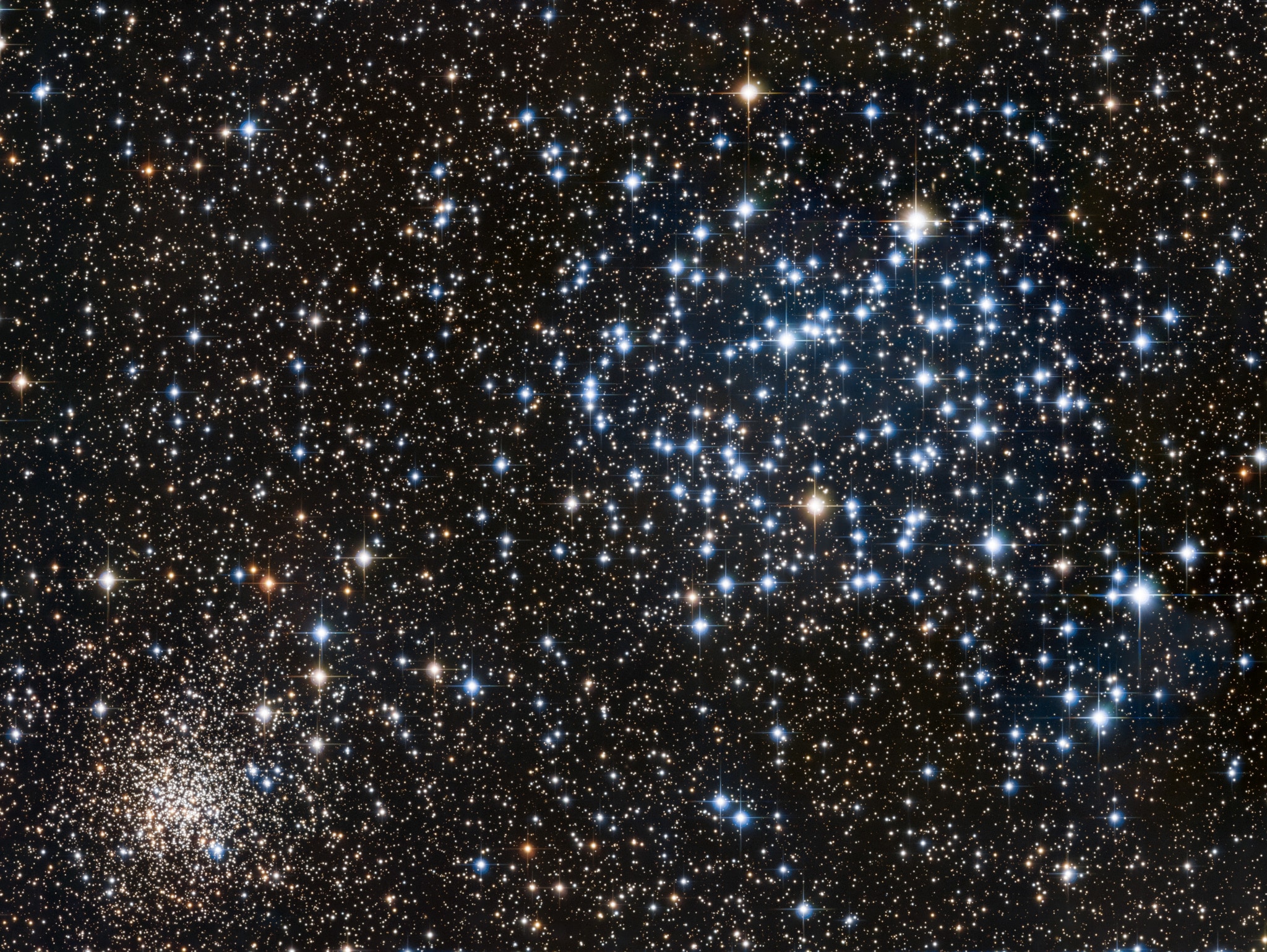 Framed in this single, starry, telescopic field of view are two open star clusters, M35 and NGC 2158. Located within the boundaries of the constellation Gemini, they do appear to be side by side. Its stars concentrated toward the upper right, M35 is relatively nearby, though. M35 (also cataloged as NGC 2168) is a mere 2800 light-years distant, with 400 or so stars spread out over a volume about 30 light-years across. Bright blue stars frequently distinguish younger open clusters like M35, whose age is estimated at 150 million years. At lower left, NGC 2158 is about four times more distant than M35 and much more compact, shining with the more yellowish light of a population of stars over 10 times older. In general, open star clusters are found along the plane of our Milky Way Galaxy. Loosely gravitationally bound, their member stars tend to be dispersed over billions of years as the open star clusters orbit the galactic center.