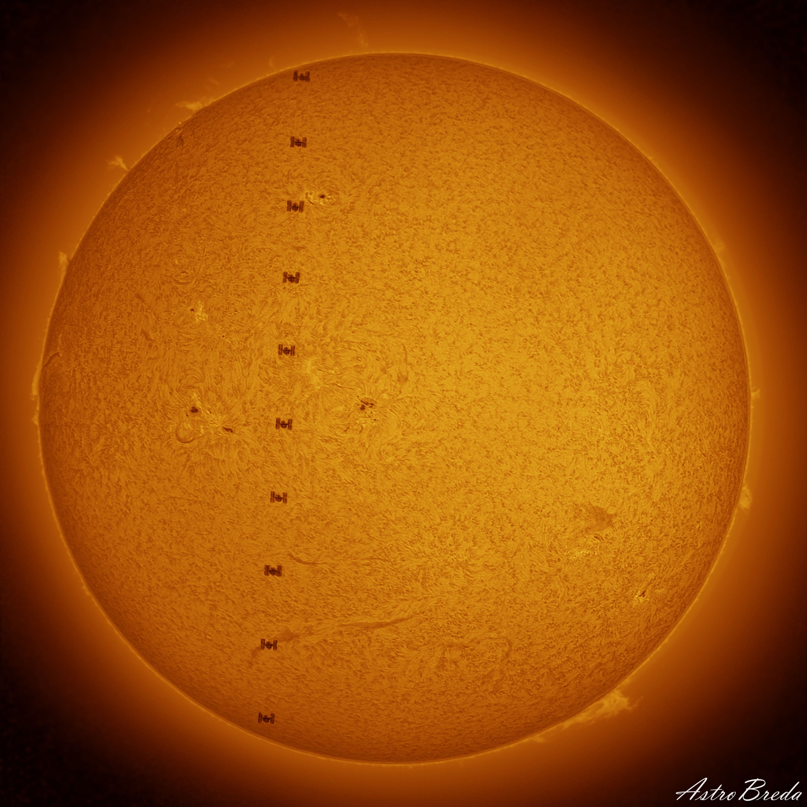 Typically, the International Space Station is visible only at night.  Slowly drifting across the night sky as it orbits the Earth, the International Space Station (ISS) can be seen as a bright spot about once a month from many locations.  The ISS is then visible only just after sunset or just before sunrise because it shines by reflected sunlight -- once the ISS enters the Earth's shadow, it will drop out of sight. The only occasion when the ISS is visible during the day is when it passes right in front of the Sun. Then, it passes so quickly that only cameras taking short exposures can visually freeze the ISS's silhouette onto the background Sun. The featured picture did exactly that -- it is actually a series of images taken a month ago from Sant Feliu de Buixalleu, Spain with perfect timing.  This image series was later combined with a separate image highlighting the texture of the active Sun which included several Sun's prominences around the edge.   Celestial Surprise: What picture did APOD feature on your birthday? (post 1995)