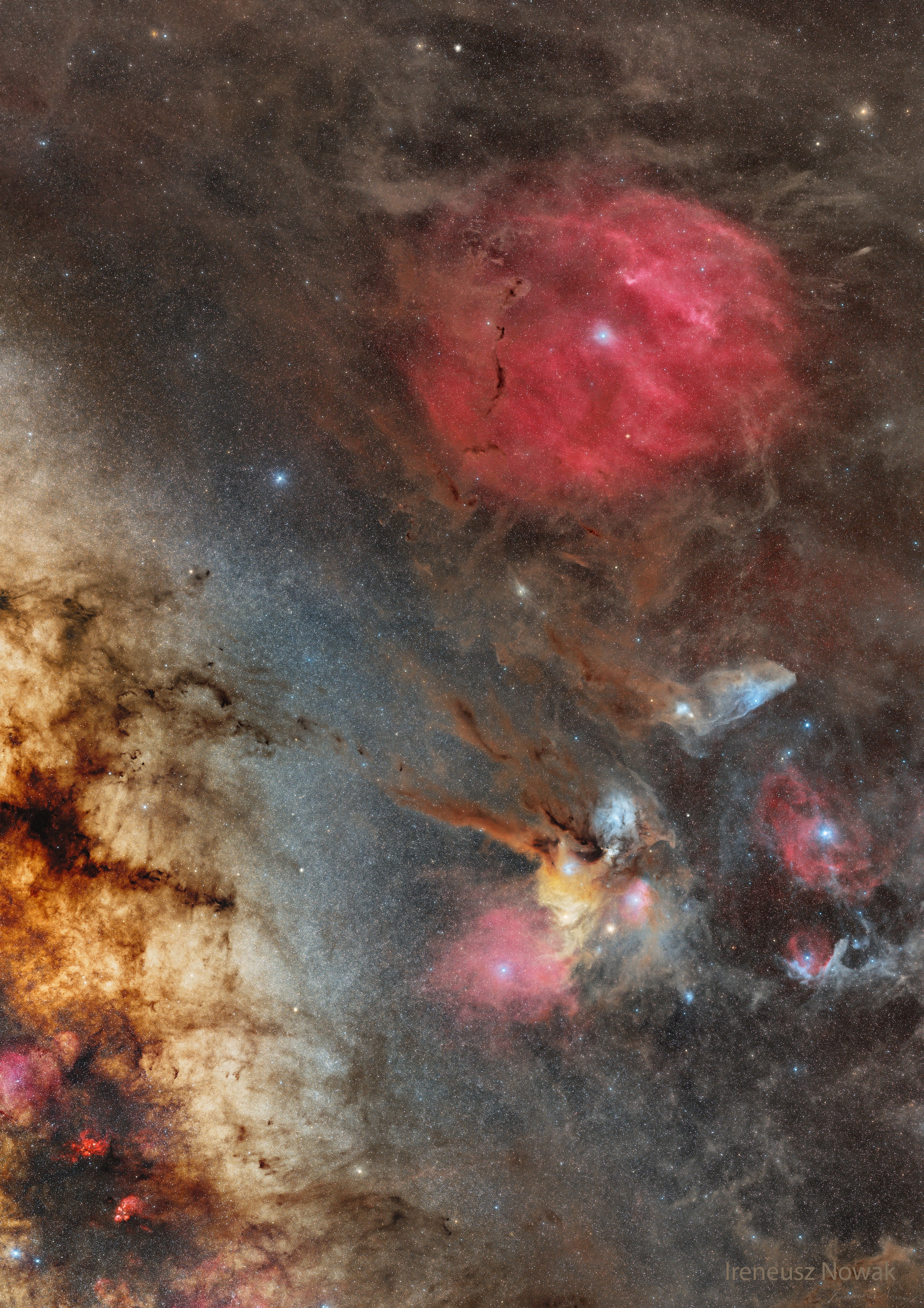 Behold one of the most photogenic regions of the night sky, captured impressively.  Featured, the band of our Milky Way Galaxy runs diagonally along the bottom-left corner, while the colorful Rho Ophiuchi cloud complex is visible just right of center and the large red circular Zeta Ophiuchi Nebula appears near the top.  In general, red emanates from nebulas glowing in the light of excited hydrogen gas, while blue marks interstellar dust preferentially reflecting the light of bright young stars.  Thick dust usually appears dark brown.  Many iconic objects of the night sky appear, including (can you find them?) the bright star Antares, the globular star cluster M4, and the Blue Horsehead nebula. This wide field composite, taken over 17 hours, was captured from South Africa last June.    Explore Your Universe: Random APOD Generator
