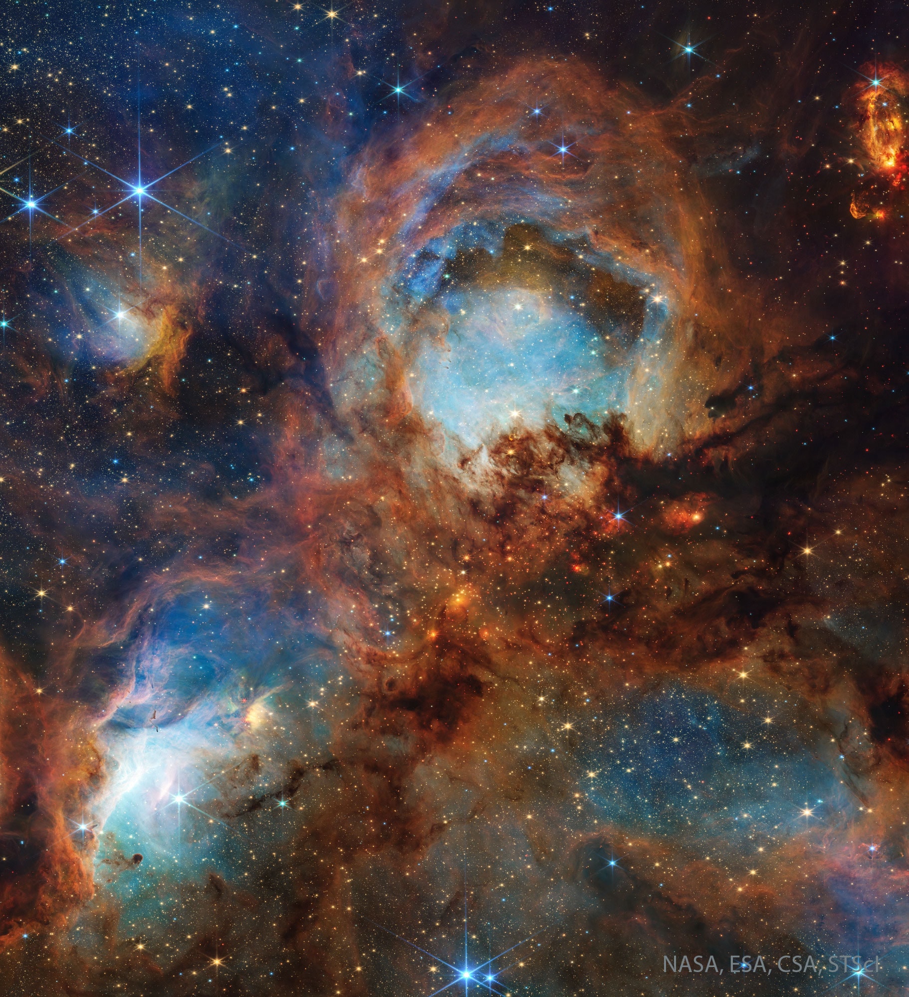 Nebulas are perhaps as famous for being identified with familiar shapes as perhaps cats are for getting into trouble.  Still, no known cat could have created the vast Cat's Paw Nebula visible toward the constellation of the Scorpion  (Scorpius).  At 5,700 light years distant, Cat's Paw is an emission nebula within a larger molecular cloud.  Alternatively known as the Bear Claw Nebula and cataloged as NGC 6334, stars nearly ten times the mass of our Sun have been born there in only the past few million years. Pictured here is a recently released image of the Cat's Paw taken in infrared light by the James Webb Space Telescope.  This newly detailed view into the nebula helps provide insight for how turbulent molecular clouds turn gas into stars.    Explore Your Universe: Random APOD Generator