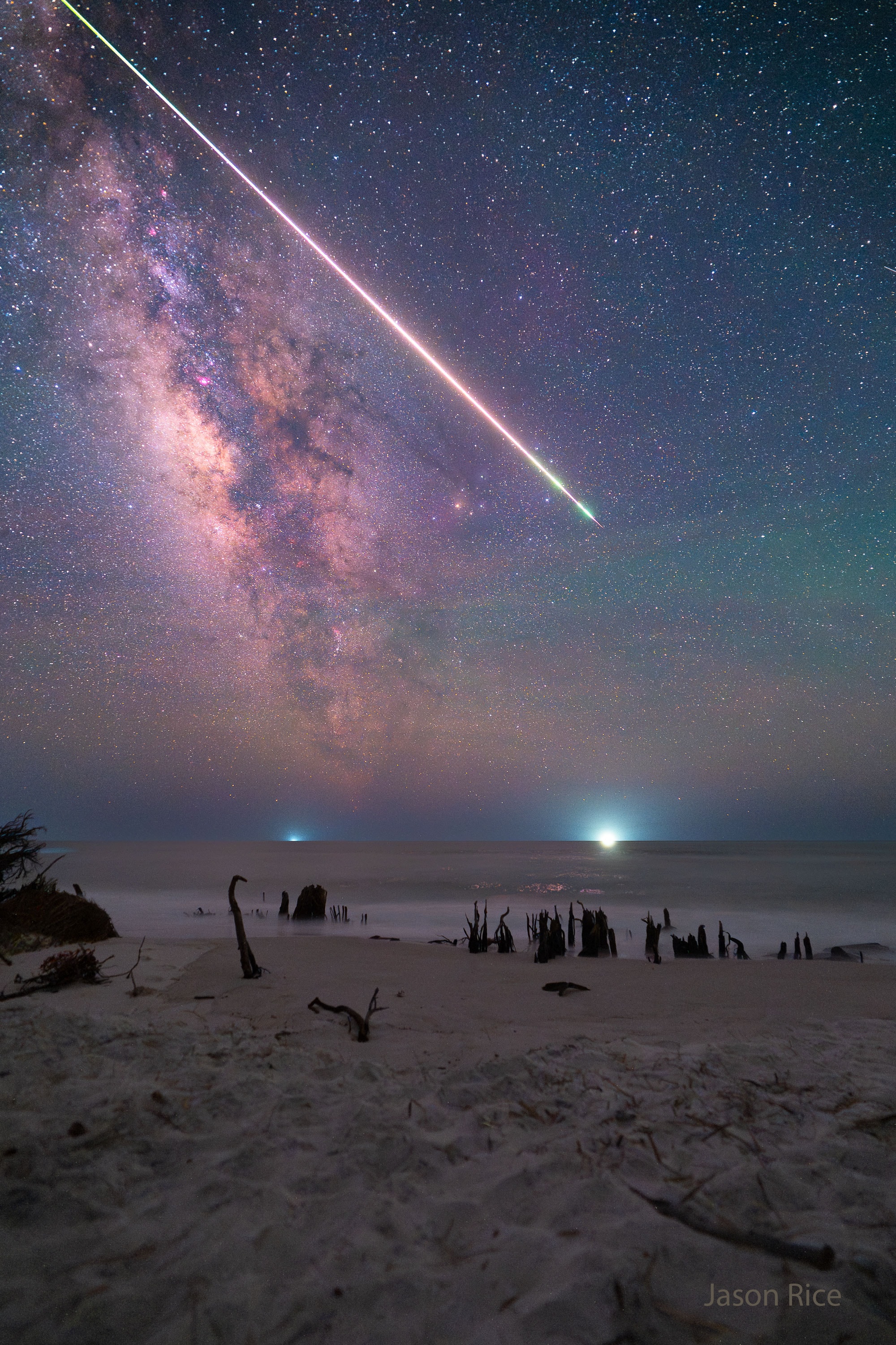 Have you ever seen a fireball?  In astronomy, a fireball is a very bright meteor -- one at least as bright as Venus and possibly brighter than even a full Moon. Fireballs are rare -- if you see one you are likely to remember it for your whole life.  Physically, a fireball is a small rock that originated from an asteroid or comet that typically leaves a fading smoke trail of gas and dust as it shoots through the Earth's atmosphere.  It is unlikely that any single large ground strike occurred -- much of the rock likely vaporized as it broke up into many small pieces. The featured picture was captured last week from a deadwood beach in Cape San Blas, Florida, USA.   Piece it Back Together: Astronomy Puzzle of the Day