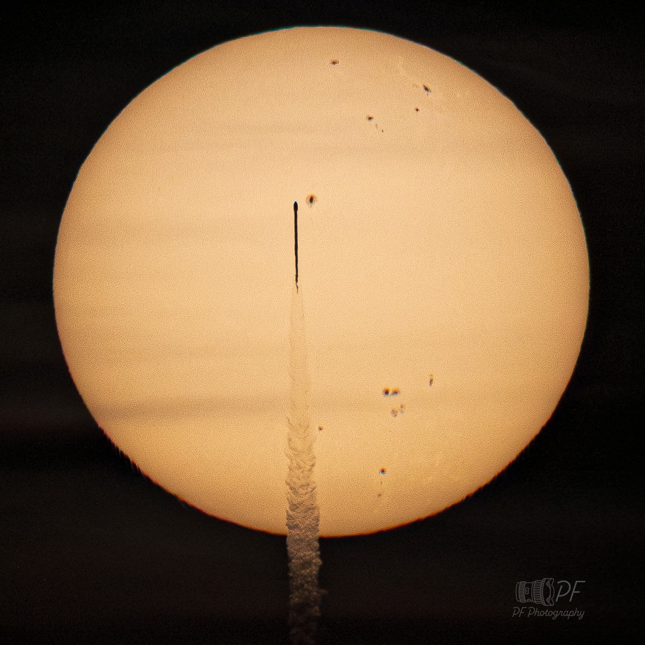 On the morning of September 24 a rocket crosses the bright solar disk in this long range telescopic snapshot captured from Orlando, Florida. That's about 50 miles north of its Kennedy Space Center launch site. This rocket carried three new space weather missions to space. Signals have now been successfully acquired from all three - NASA's Interstellar Mapping and Acceleration Probe, NASA’s Carruthers Geocorona Observatory, and the National Oceanic and Atmospheric Administration (NOAA) Space Weather Follow-On Lagrange 1 (SWFO-L1) - as they begin their journey to L1, an Earth-Sun lagrange point. L1 is about 1.5 million kilometers in the sunward direction from planet Earth. Appropriately, major space weather influencers, aka dark sunspots in active regions across the Sun, are posing with the transiting rocket. In fact, large active region AR4225 is just right of the rocket's nose.
