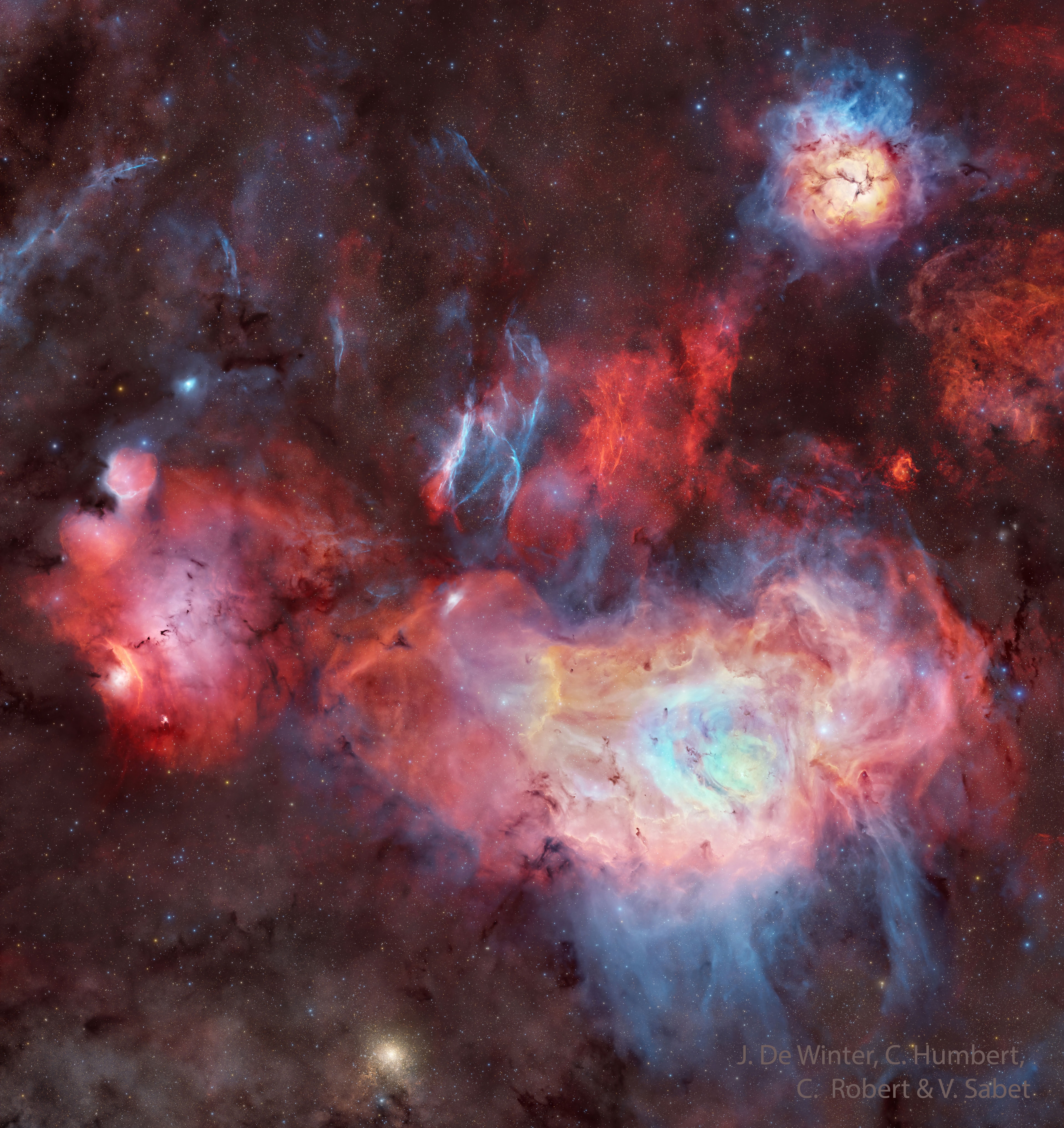 Can you spot famous celestial objects in this image?  18th-century astronomer Charles Messier cataloged only two of them: the bright Lagoon Nebula (M8) at the bottom, and the colorful Trifid Nebula (M20) at the upper right.  The one on the left that resembles a cat's paw is NGC 6559, and it is much fainter than the other two.  Even harder to spot are the thin blue filaments on the left, from supernova remnant (SNR G007.5-01.7).  Their glow comes from small amounts of glowing oxygen atoms that are so faint that it took over 17 hours of exposure with just one blue color to bring up. Framing this scene of stellar birth and death are two star clusters: the open cluster M21 just above Trifid, and the globular cluster NGC 6544 at lower left.