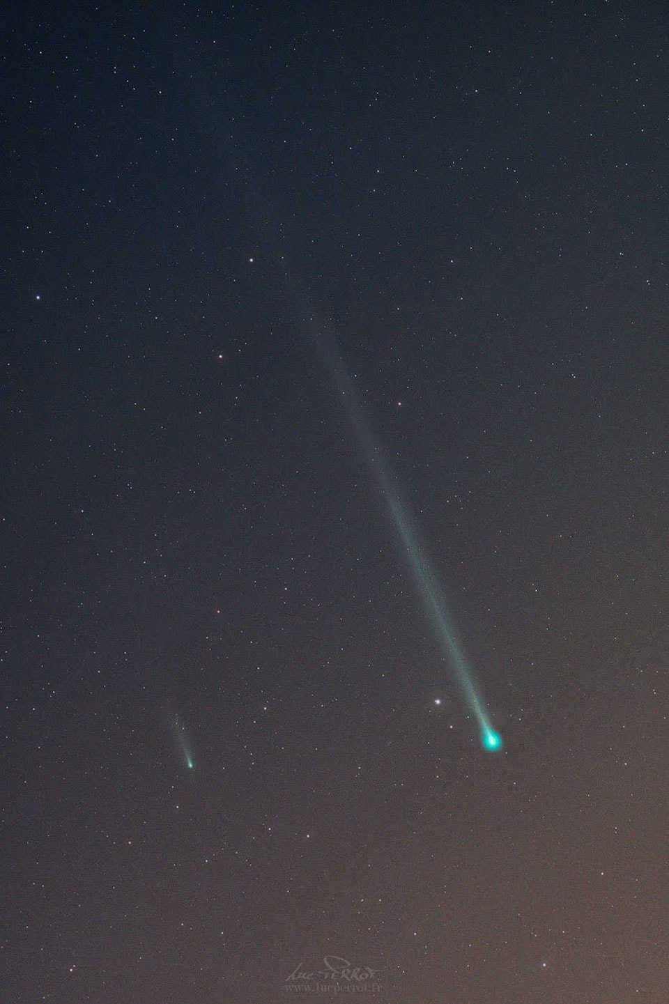 It may look like these comets are racing, but they are not. Comets C/2025 K1 ATLAS (left) and C/2025 R2 SWAN (right) appeared near each other by chance last week in the featured image taken from France's Reunion Island in the southern Indian Ocean.  Fainter Comet ATLAS is approaching our Sun and will reach its closest approach in early October when it is also expected to be its brightest -- although still only likely visible with long exposures on a camera.  The brighter comet, nicknamed SWAN25B, is now headed away from our Sun, although its closest approach to Earth is expected in mid-October, when optimistic estimates have it becoming bright enough to see with the unaided eye.  Each comet has a greenish coma of expelled gas and an ion tail pointing away from the Sun.    Growing Gallery: Comet SWAN25B