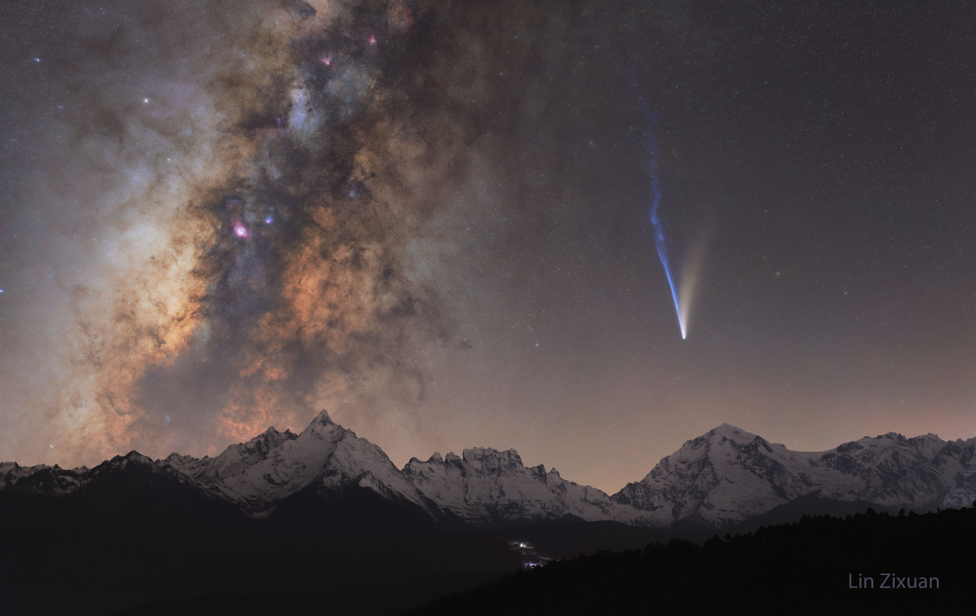 What did Comet Lemmon look like when it was at its best? One example is pictured here, featuring three celestial spectacles all at different distances. The closest spectacle is the snowcapped Meili Mountains, part of the Himalayas in China.  The middle marvel is Comet Lemmon near its picturesque best early this month, showing not only a white dust tail trailing off to the right but its blue solar wind-distorted ion tail trailing off to the left.  Far in the distance on the left is the magnificent central plane of our Milky Way Galaxy, featuring dark dust, red nebula, and including billions of Sun-like stars. Comet C/2025 A6 (Lemmon) is already fading as it heads back into the outer Solar System, while the Himalayan mountains will gradually erode over the next billion years. The Milky Way Galaxy, though, will live on -- forming new mountains and comets -- for many billions of years into the future.