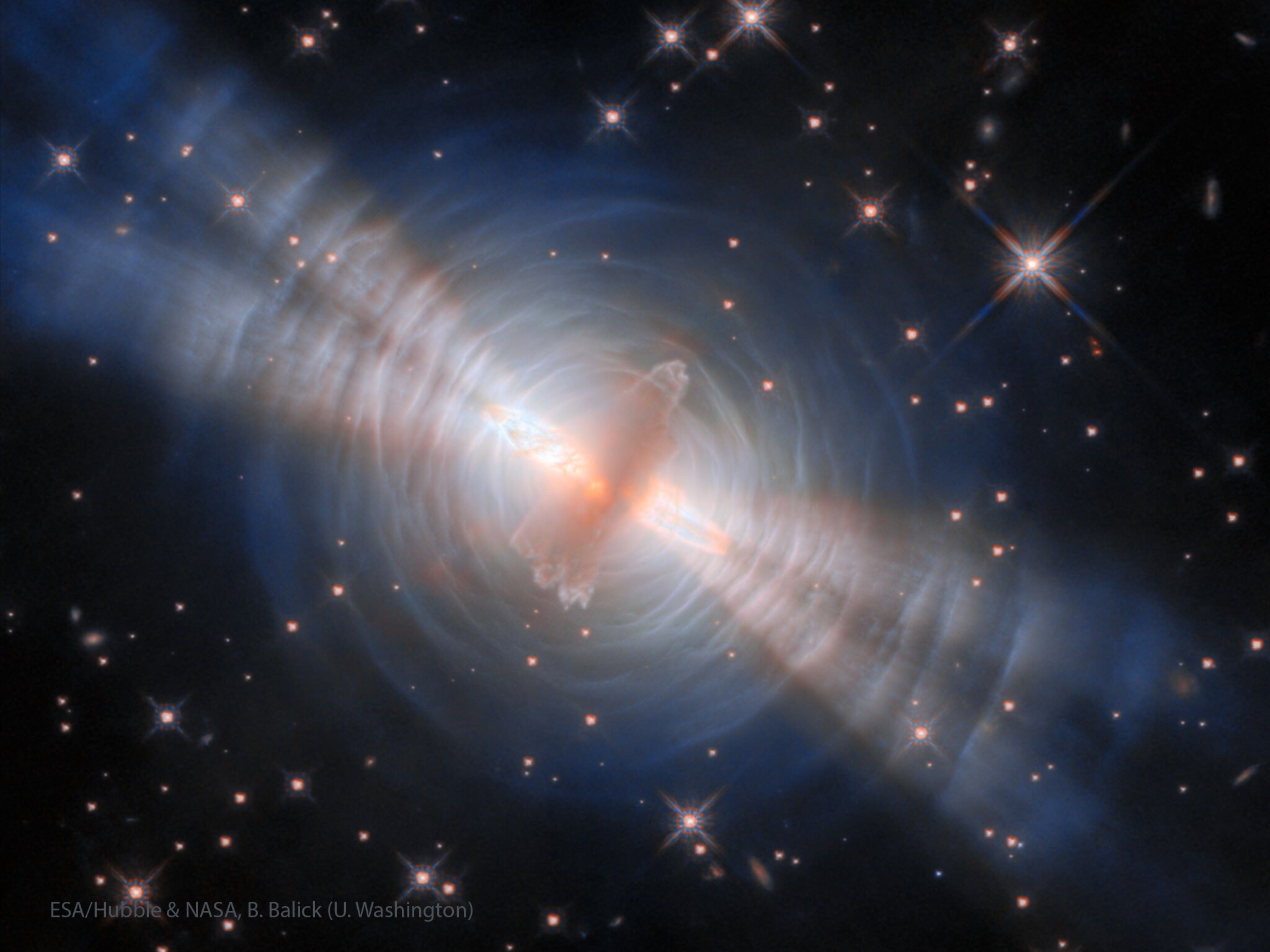 ver wonder what it would look like to crack open the Sun?  The Egg Nebula, a dying Sun-like star, can unscramble this question.  Pictured is a combination of several visible and infrared images of the nebula (also known as RAFGL 2688 or CRL 2688) taken with the Hubble Space Telescope.  The star has shed its outer layers, and a bright, hot core (or "yolk") now illuminates the milky "egg white" shells of gas and dust surrounding the center.  The central lobes and rings are structures of gas and dust recently ejected into space, with the dust being dense enough to block our view of the stellar core.  Light beams emanate from that blocked core, escaping through holes carved in the older ejected material by newer, faster jets expelled from the star’s poles.  Astronomers are still trying to figure out what causes the disks, lobes, and jets during this short (only a few thousand years!) phase of the star’s evolution, making this an egg-cellent image to study!