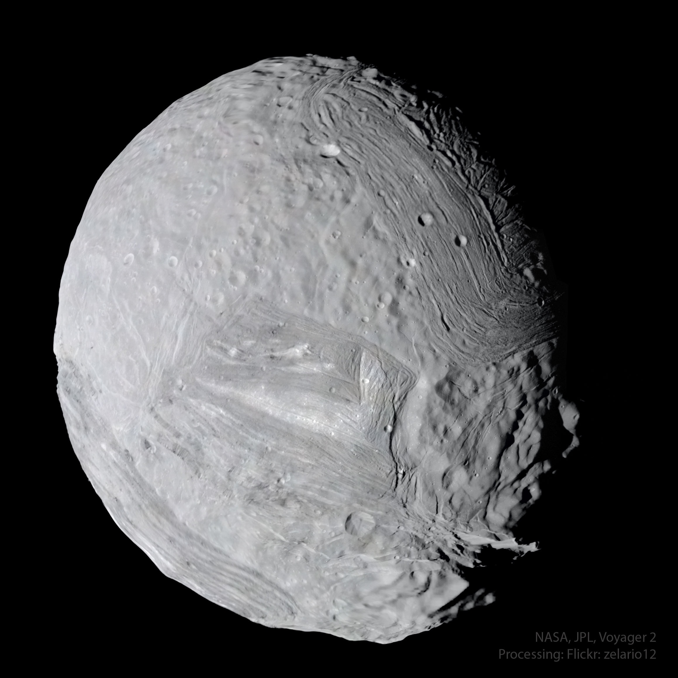 What is Miranda really like?  Visually, old images from NASA's Voyager 2 have been recently combined and remastered to result in the featured image of Uranus's 500-kilometer-wide moon. In the late 1980s, Voyager 2 flew by Uranus, coming close to the cratered, fractured, and unusually grooved moon -- named after a character from Shakespeare’s The Tempest.  Scientifically, planetary scientists are using old data and clear images to theorize anew about what shaped Miranda's severe surface features.  A leading hypothesis is that Miranda, beneath its icy surface, may have once hosted an expansive liquid water ocean which may be slowly freezing.  Thanks to the legacy of Voyager 2, Miranda has joined the ranks of Europa, Titan, and other icy moons in the search for water, and, possibly, microbial life, in our Solar System.   Jigsaw Moon: Astronomy Puzzle of the Day