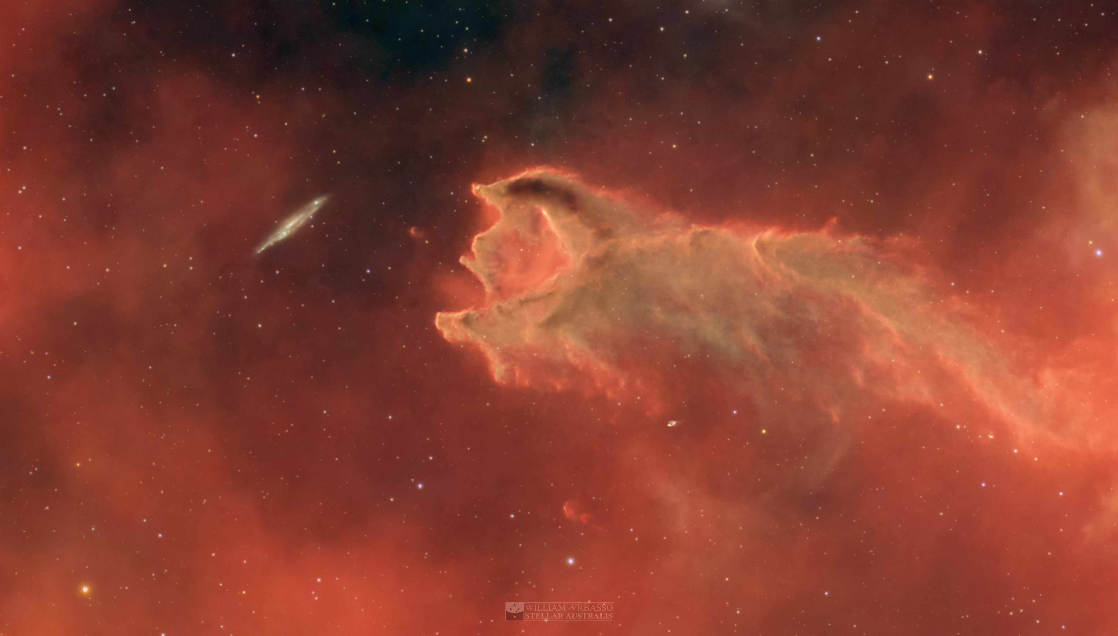 Is this a cosmic monster ready to devour an unsuspecting galaxy? Thankfully, that is not the case. The red “monster” shown in the featured image is Cometary Globule CG 4, 1,300 light-years away in the Constellation Puppis. CG 4 is a molecular cloud, where hydrogen becomes cold enough to form molecules that can be brought together by gravity to create stars. The shape of CG 4 resembles that of a comet, but its head is 1.5 light-year in diameter and its tail is 8 light-years long; for comparison, the distance from the Earth to the sun is only 8 light-minutes. Astronomers believe that the tail of a cometary globule could have been shaped by a nearby supernova explosion or by irradiation from hot, massive stars. Indeed, CG 4 and other nearby globules point away from the Vela Supernova Remnant, at the center of the Gum Nebula. The edge-on spiral galaxy, ESO 257-19, is more than a hundred million light-years beyond CG 4, and is completely safe from the “monster”.