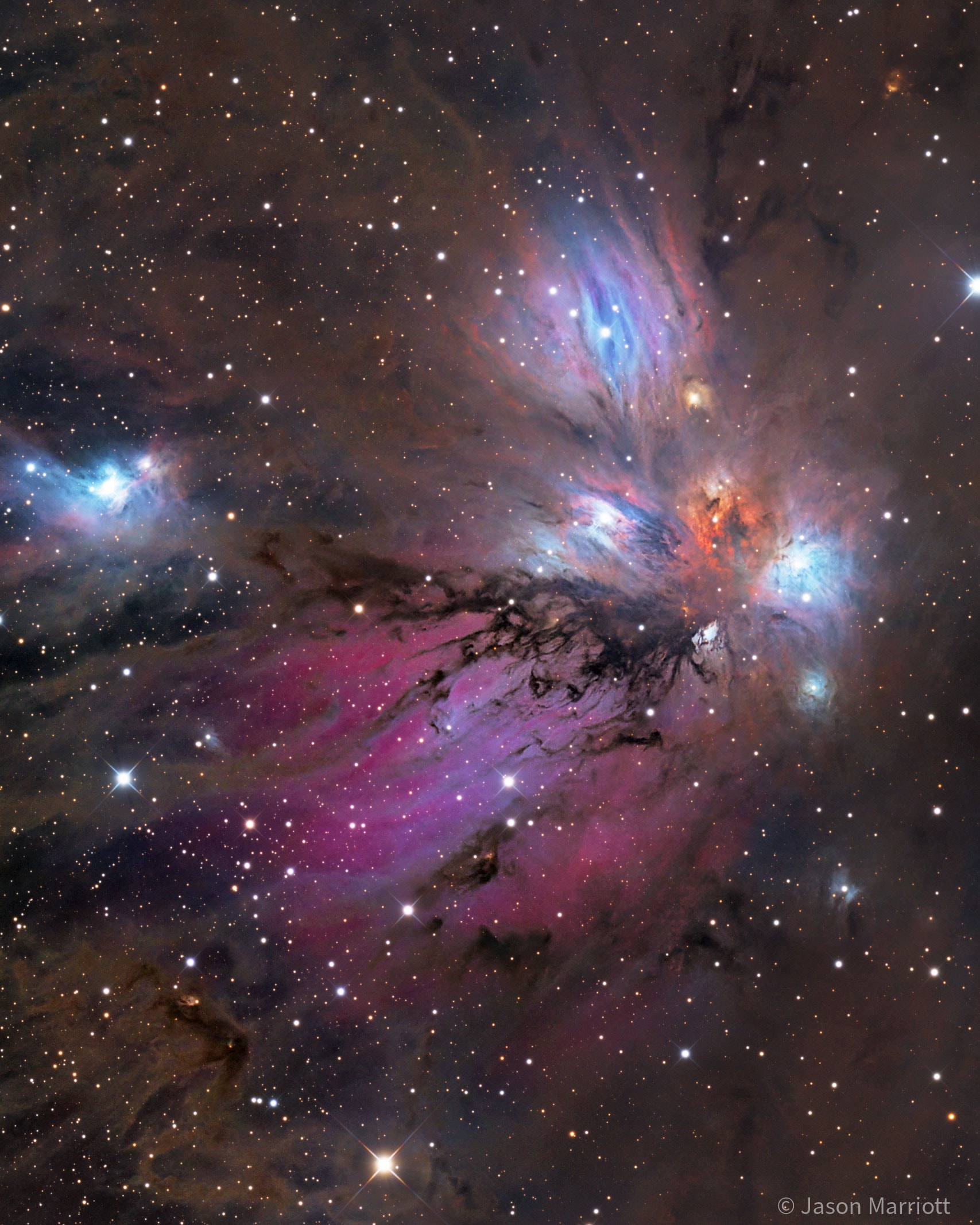 Is this a painting or a photograph? In this celestial abstract art composed with a cosmic brush, dusty nebula NGC 2170, also known as the Angel Nebula, shines just above the image center. Reflecting the light of nearby hot stars, NGC 2170 is joined by other bluish reflection nebulae, a red emission region, many dark absorption nebulae, and a backdrop of colorful stars. Like the common household items that abstract painters often choose for their subjects, the clouds of gas, dust, and hot stars featured here are also commonly found in a setting like this one --  a massive, star-forming molecular cloud in the constellation of the Unicorn (Monoceros). The giant molecular cloud Mon R2, is impressively close, estimated to be only 2,400 light-years or so away. At that distance, this canvas would be over 60 light-years across.   Almost Hyperspace: Random APOD Generator