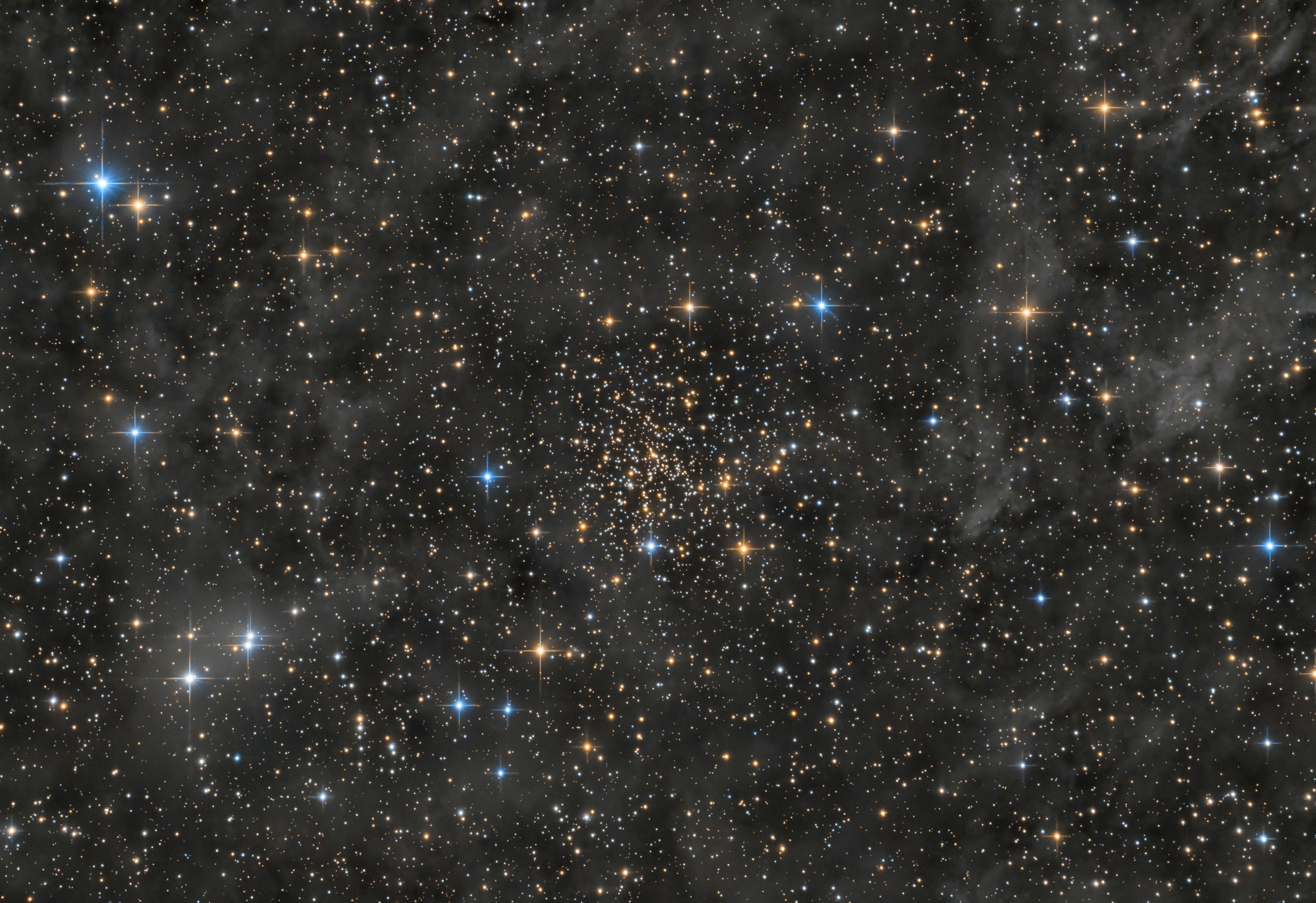 The New General Catalog of star clusters and nebulae really isn't so new. In fact, it was published in 1888 - an effort by J. L. E. Dreyer to consolidate the work of astronomers William, Caroline, and John Herschel along with others into a useful single, complete catalog of astronomical discoveries and measurements. Dreyer's work was largely successful and is still important today, as this famous catalog continues to lend its "NGC" to bright clusters, galaxies, and nebulae. Take for example the star cluster known as NGC 188 (item number 188 in the NGC compilation). It lies about 6,000 light-years distant in the northern constellation Cepheus and represents a galactic or open star cluster. With an age of about 7 billion years, NGC 188 is old for an open cluster. Its old, evolved red giant stars have yellowish hues in this colorful, deep sky view. NGC 188 also enjoys the designation Caldwell 1 in a modern compilation of deep sky objects. Located well above the plane of the Milky Way and seen in the direction of planet Earth's north celestial pole, the ancient stellar group is known to some as the Polarissima Cluster.