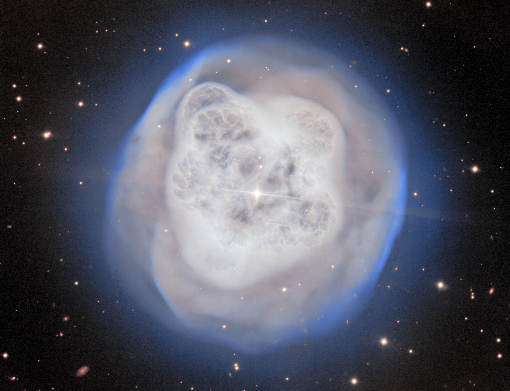 What do you see in this crystal ball?   The featured image shows NGC 1514, known as the Crystal Ball Nebula, observed by the Gemini North telescope on Maunakea, in Hawai'i.   NGC 1514 is 1,500 light-years away and was discovered by William Herschel in 1790.   This planetary nebula is formed when a star becomes a red giant and ejects its outer gas layers.   The ejected shell of gas is heated up by the core of the star to temperatures hotter than the surface of our Sun: that makes the gas shine, creating beautiful images like this one.       The slightly asymmetrical shape of the Crystal Ball Nebula reveals a secret: the bright star in the center has a companion.   As the two stars orbit each other with a period of about nine years, they shape the gas around them.   In about 10,000 - 25,000 years the nebula will be dissipated by their stellar winds.