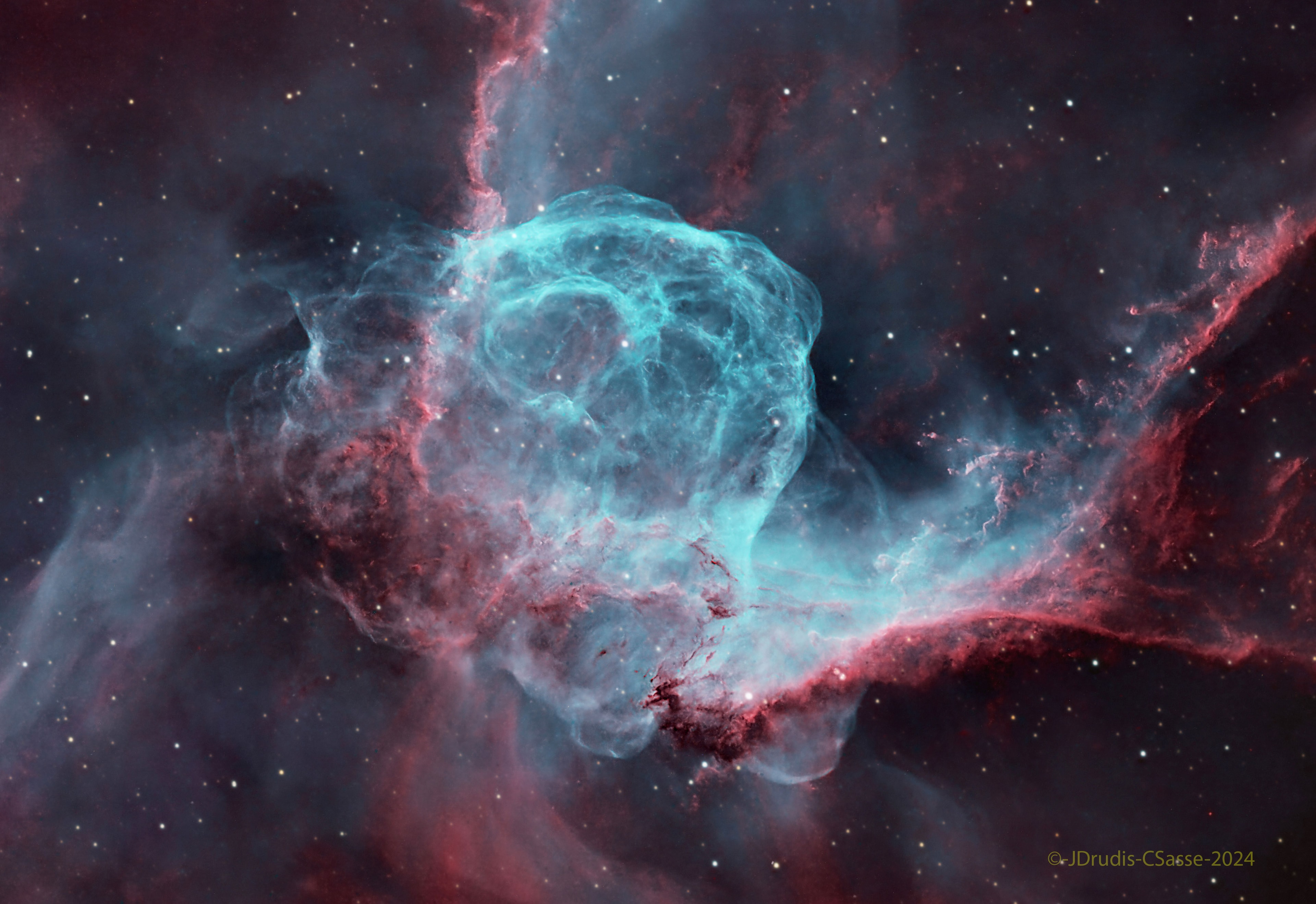 Thor not only has his own day (Thursday), but a helmet in the heavens.  Popularly called Thor's Helmet, NGC 2359 is a hat-shaped cosmic cloud with wing-like appendages. Heroically sized even for a Norse god, Thor's Helmet is about 30 light-years across. In fact, the cosmic head-covering is more like an interstellar bubble, blown by a fast wind from the bright, massive star near the bubble's center. Known as a Wolf-Rayet star, the central star is an extremely hot giant thought to be in a brief, pre-supernova stage of evolution. NGC 2359 is located about 15,000 light-years away toward the constellation of the Great Overdog. This sharp image is a combination of deep images taken in light emitted by hydrogen (red) and oxygen (blue).  The star in the center of Thor's Helmet is expected to explode in a spectacular supernova sometime within the next few thousand years.   Sky Surprise: What picture did APOD feature on your birthday? (after 1995)