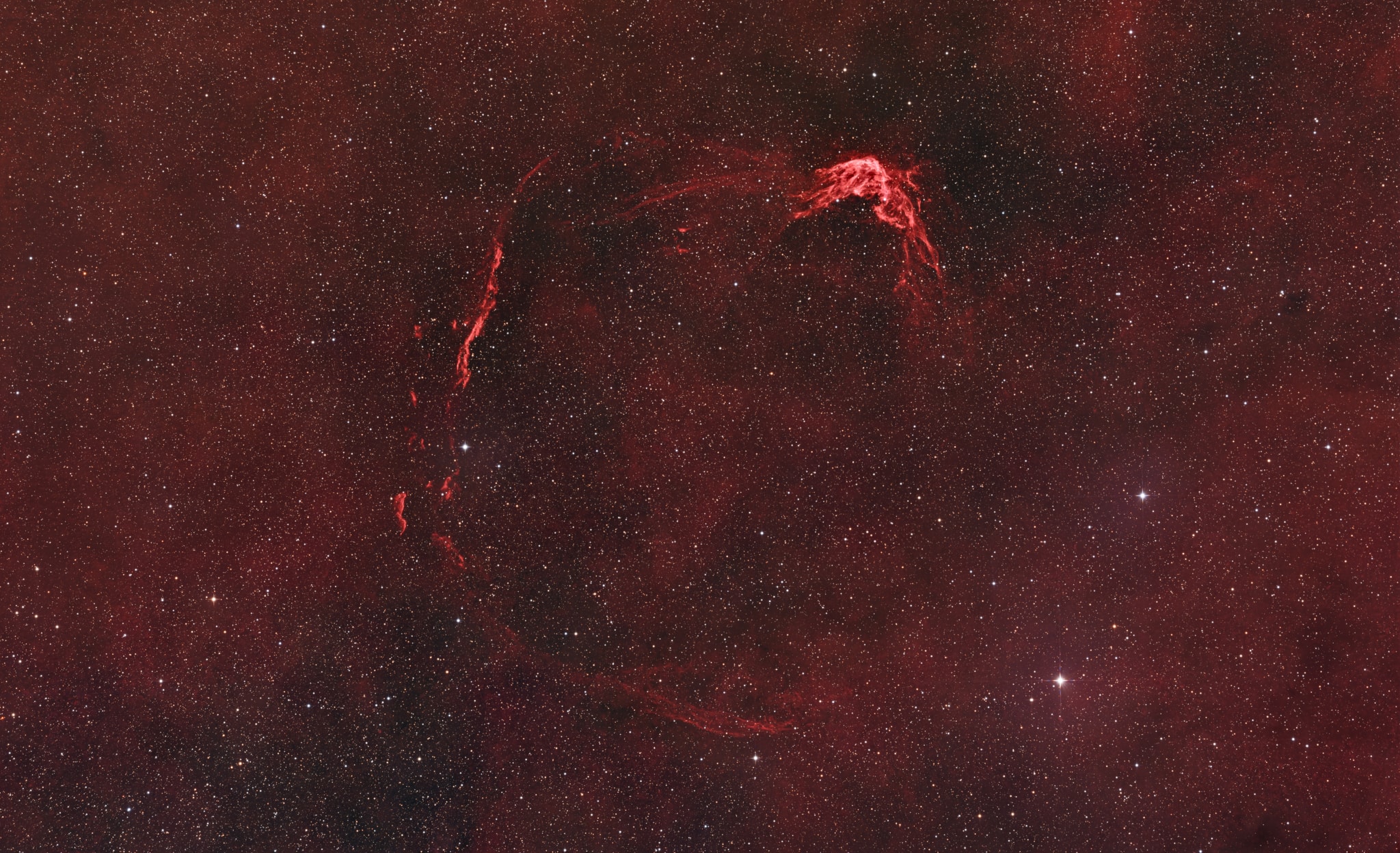 In 185 AD, Chinese astronomers recorded the appearance of a new star in the Nanmen asterism. That part of the sky is identified with part of the southern constellation Centaurus on modern star charts. In fact, the new star was reported to be visible to the naked-eye for months before it faded from view, and is now thought to be the earliest recorded supernova. In this 21st century telescopic image, the wispy outlines of a faint emission nebula recognized as the remnant of that historical stellar explosion can be traced against a starry background. The ragged but roughly circular extent of the nebula, cataloged as RCW 86, represents interstellar gas ionized by the supernova's still expanding shock wave. Space-based images indicate an abundance of the element iron in RCW 86 and the absence of a neutron star or pulsar within the remnant, suggesting that the original supernova was Type Ia. Unlike the core collapse supernova explosion of a massive star, a Type Ia supernova is a thermonuclear detonation on a white dwarf star that has accreted material from its companion in a binary star system. Near the plane of our Milky Way galaxy and larger than the full moon on the sky this supernova remnant is too faint to be seen by eye though. RCW 86 is some 8,000 light-years distant and around 100 light-years across.