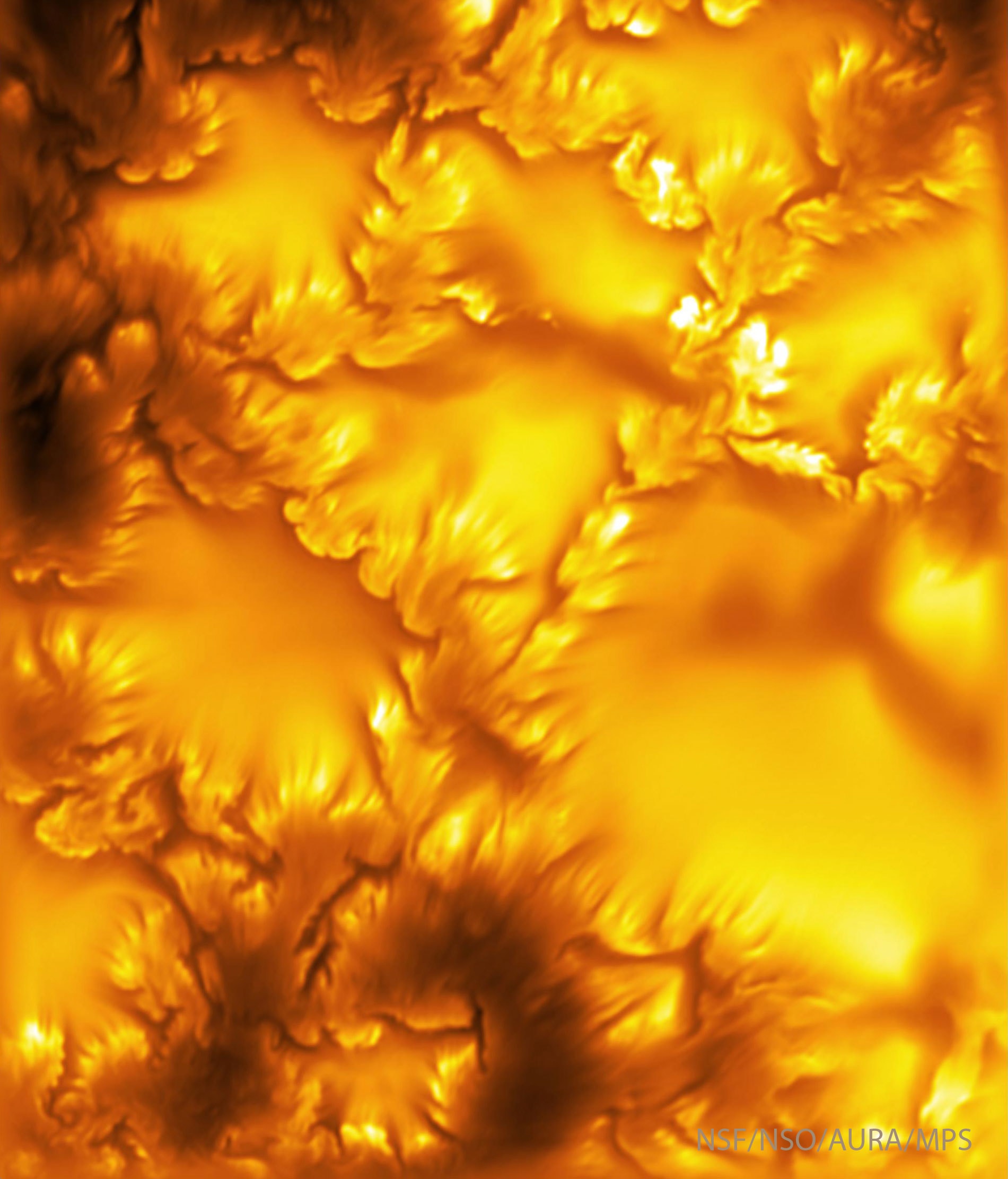 What does the new sharpest image of our Sun show? Instability. To be clear, a certain kind of interactive process called the Kelvin-Helmholtz instability (KHI). This instability can create waves and swirls when two streams flow past each other -- in this case variable streams of solar magnetic plasma. Long hypothesized to occur on the Sun's surface, KHI streaks and swirls were confirmed in just-released dramatic high-resolution images taken recently by the Inouye Solar Telescope in Hawaii, USA.  The featured false-yellow image, actually taken in deep blue, is the highest resolution image yet of the Sun in visible light. It spans about the radius of the Earth, but its finest details are city sized.  Visible are several smooth tops of changing solar granules, while the edges of the flower-like structures have been found to harbor multiple KHI swirls.  Future research may investigate how the KHI helps move energy, magnetic fields, and may even heat the surrounding solar corona.