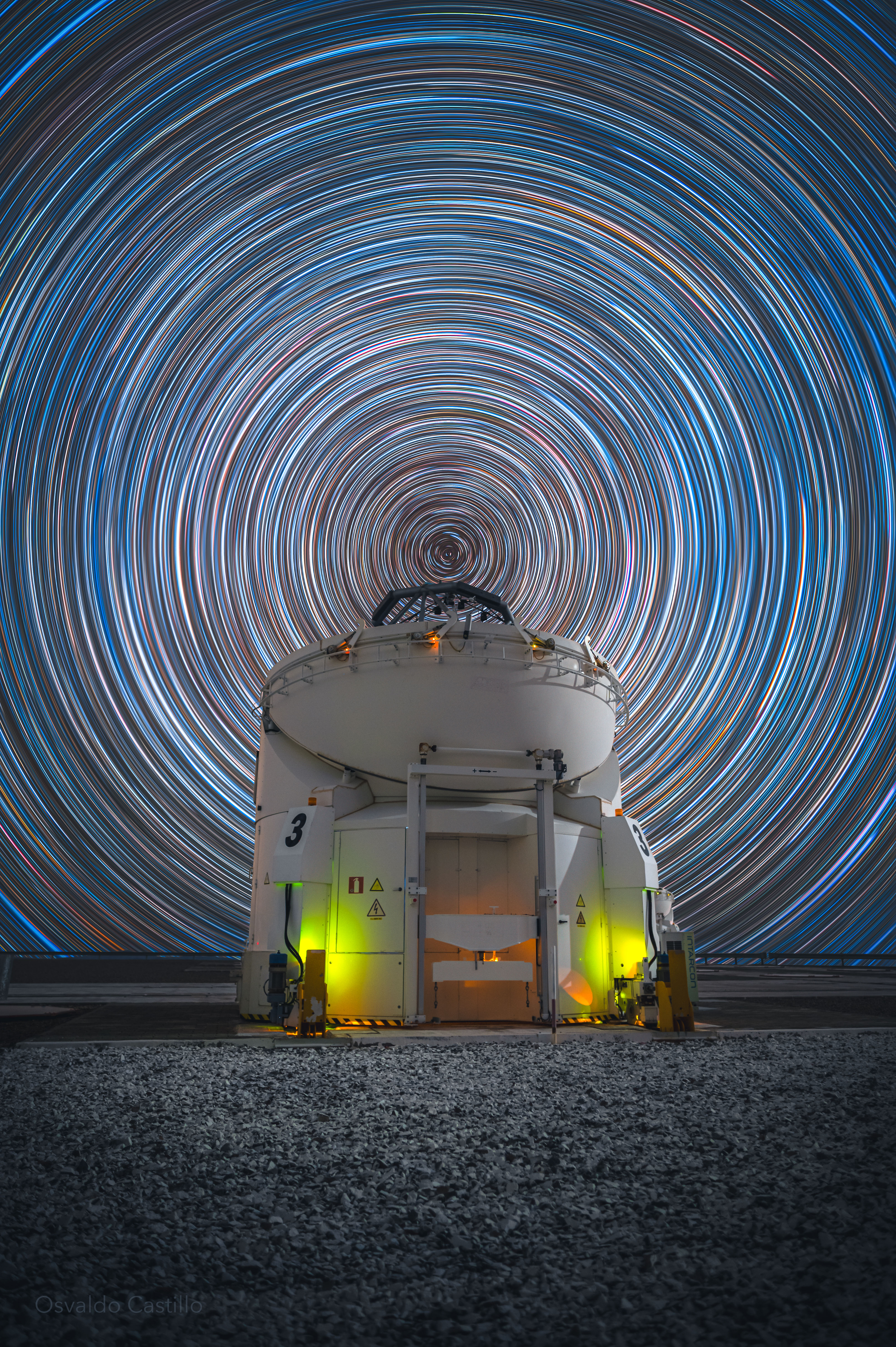 At the latitude of ESO's Paranal Observatory in Chile, about 25 degrees south, Earth's rotation moves the planet's surface eastward at over 1,500 kilometers per hour. And while that's faster than the speed of sound at sea level, the motion is imperceptible. Still, that motion can be revealed in the apparent rotation of the night sky by photographing star trails. This star trail image was composed from a digital stack of 300 consecutive 25-second exposures made with a camera fixed to a tripod to trace the star trail arcs. The graceful arcs are concentric and centered at the south celestial pole, the southern hemisphere extension of Earth's axis of rotation into space. One of the observatory's operating 1.8 meter auxiliary telescopes, AT 3, appears beneath the south celestial pole, faintly illuminated in the foreground of this well-planned scene from a rotating planet.  APOD's main NASA site is moving: From apod.nasa.gov to science.nasa.gov/apod