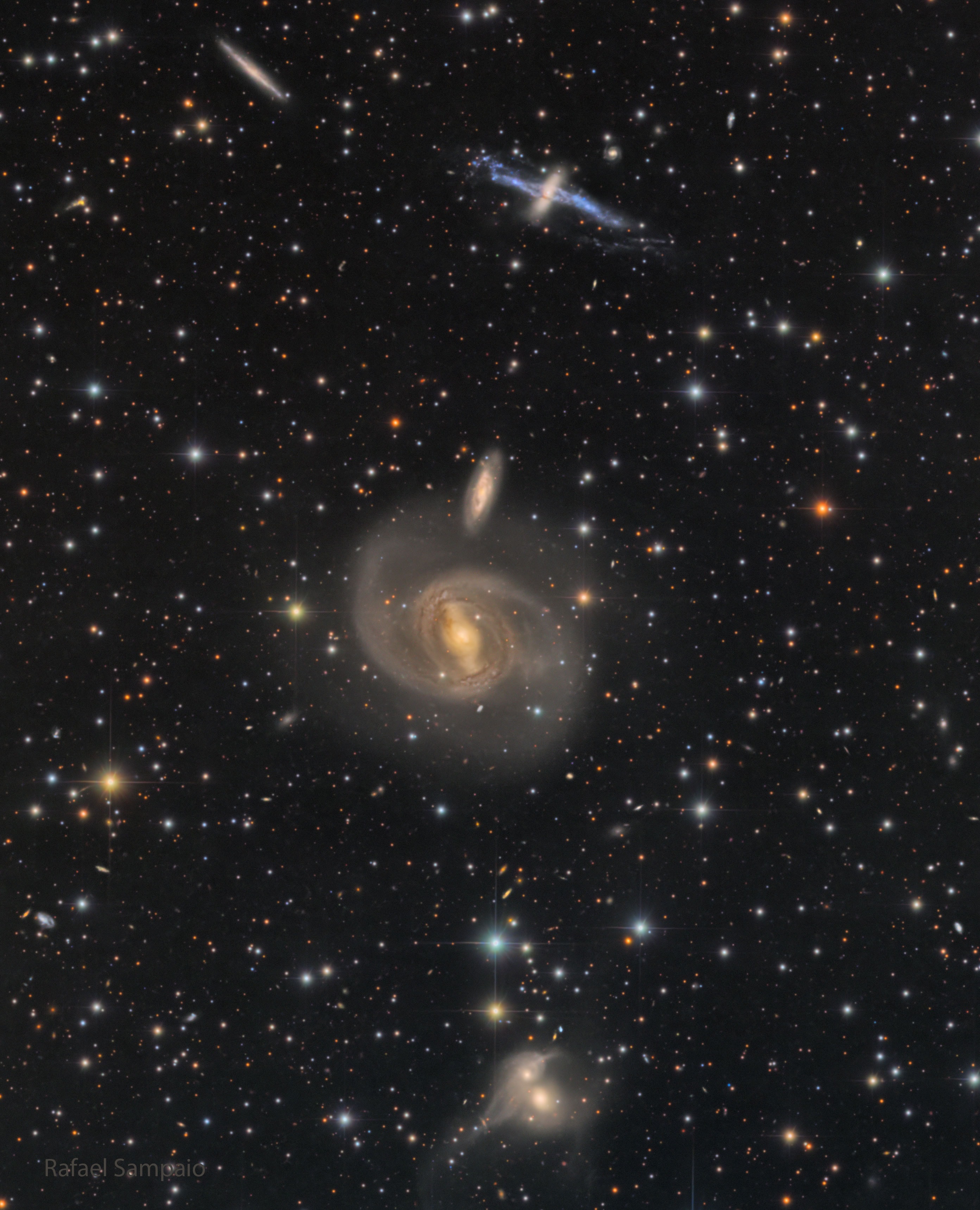 ch of these pairs of galaxies is different.  The two galaxies at the top are likely not interacting, at least presently.  However, the top galaxy with the blue stripe, NGC 4650A, is a polar ring galaxy and may be the result of a past galaxy collision. The two galaxies in the middle of the featured image appear like they could be interacting gravitationally -- but their relative speeds make this unlikely.  Of these two, the larger galaxy, NGC 4650, is a spiral galaxy with a bright bar of stars across its center.  The two galaxies at the bottom are actively interacting.  Possibly in a billion years or so, NGC 4622A and NGC 4622B will merge and become one single galaxy. All of these galaxies are likely members of the larger Centaurus Galaxy Cluster.    Explore the Universe: Random APOD Generator