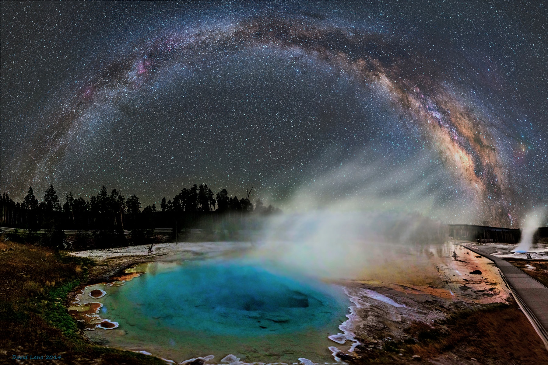 The Milky Way was not created by an evaporating lake.  The colorful pool of water, about 10 meters across, is known as Silex Spring and is located in Yellowstone National Park in Wyoming, USA.  Illuminated artificially, the colors are caused by layers of bacteria that grow in the hot spring.  Steam rises off the spring, heated by underground magma associated with the Yellowstone Hotspot.  Unrelated and far in the distance, the central band of our Milky Way Galaxy arches high overhead, a band lit by billions of stars.  The picture features a 16-image panorama taken in 2014.  If the Yellowstone Hotspot causes another supervolcanic eruption as it did about 640,000 years ago, a large part of North America would be affected.