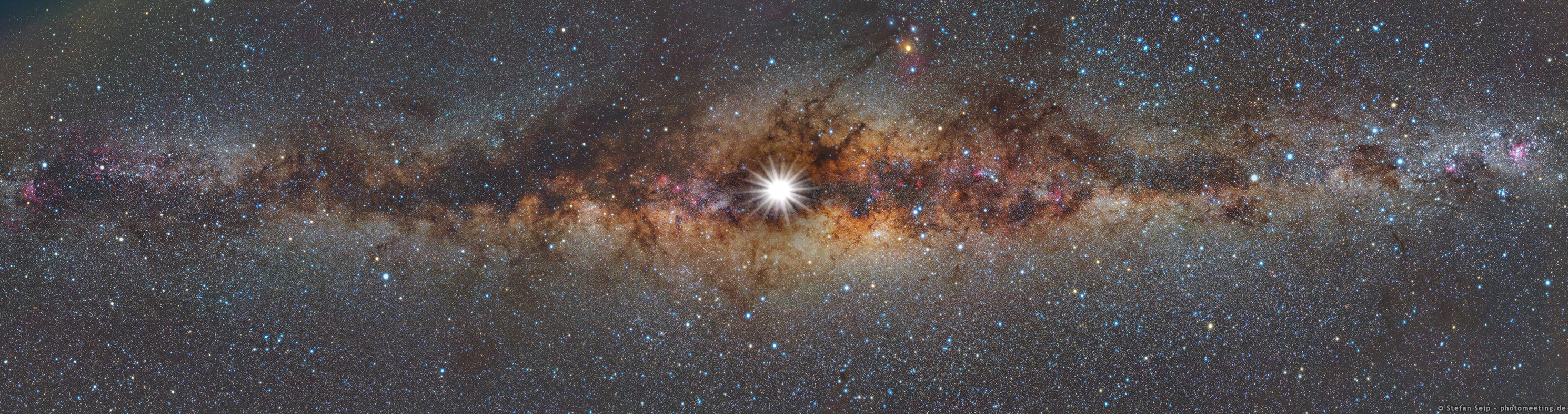 Welcome to December's solstice, first day of winter in the north and summer for the southern hemisphere. Astronomical markers of the seasons, solstice and equinox dates are based on the Sun's place in its annual journey along the ecliptic, through planet Earth's sky. At this solstice, the Sun reaches its maximum southern declination of -23.5 degrees today at 16:28 UTC, while its right ascension coordinate on the celestial sphere is 18 hours. That puts the Sun in the constellation Sagittarius in a direction near the center of our Milky Way galaxy. In fact, if you could see today's Solstice Sun against faint background stars and nebulae (that's really hard to do, especially in the daytime ...) your view might look something like this composited panorama. To make it, images of our fair galaxy were taken under dark Namibian night skies, then stitched together in a panoramic view. From a snapshot made on December 21, 2015, the Sun was digitally overlayed as a brilliant star at today's northern winter solstice position, close to the center of the Milky Way.