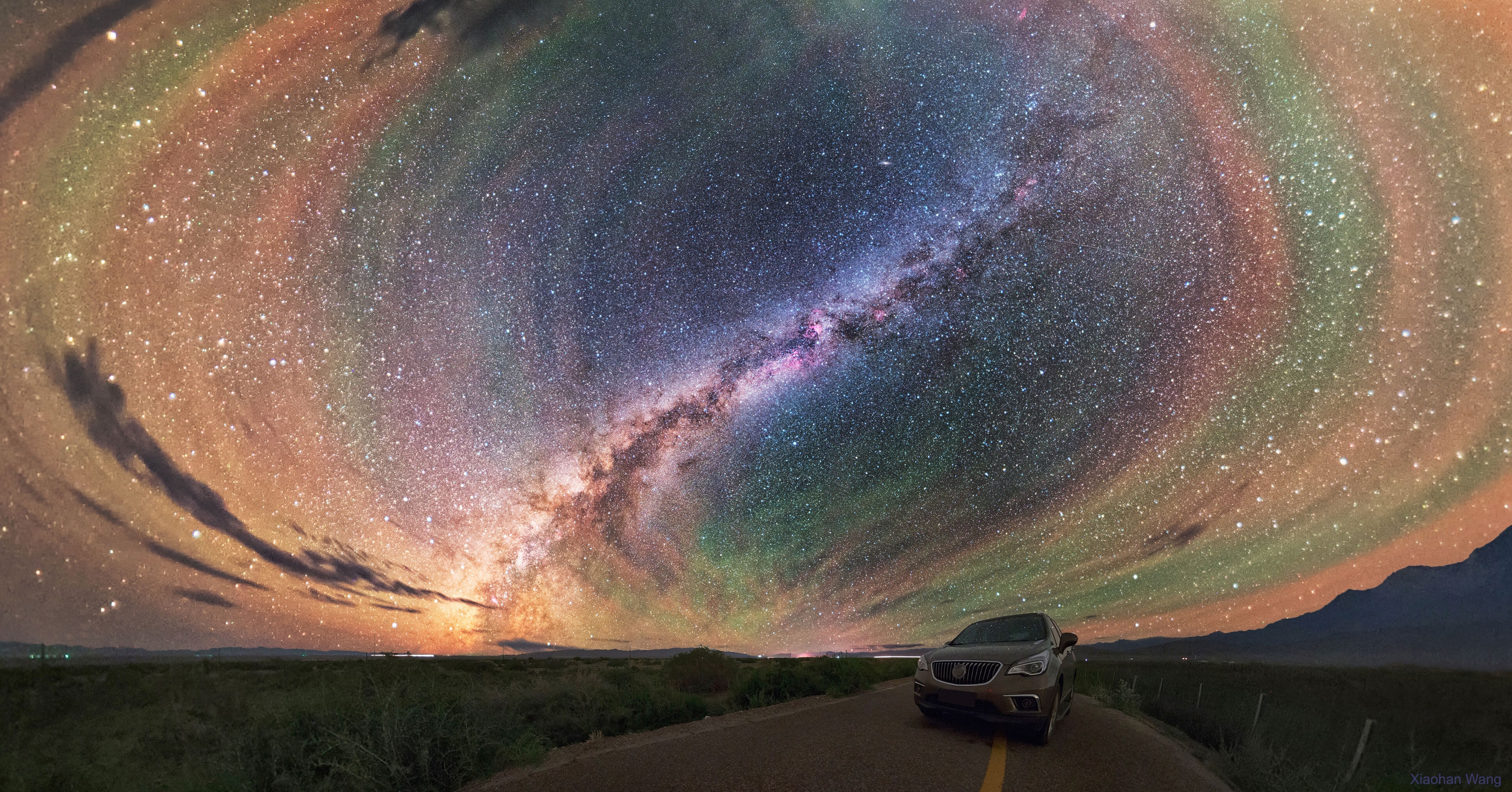 Why would the sky glow like a giant repeating rainbow? Airglow. Now air glows all of the time, but it is usually hard to see. A disturbance however -- like an approaching storm -- may cause noticeable rippling in the Earth's atmosphere. These gravity waves are oscillations in air analogous to those created when a rock is thrown in calm water. Red airglow likely originates from OH molecules about 87-kilometers high, excited by ultraviolet light from the Sun, while orange and green airglow is likely caused by sodium and oxygen atoms slightly higher up. While driving near Keluke Lake in Qinghai Provence in China, the photographer originally noticed mainly the impressive central band of the Milky Way Galaxy. Stopping to photograph it, surprisingly, the resulting sensitive camera image showed airglow bands to be quite prominent and span the entire sky. The featured image has been digitally enhanced to make the colors more vibrant. Follow APOD on: Facebook, Google Plus, Instagram, or Twitter