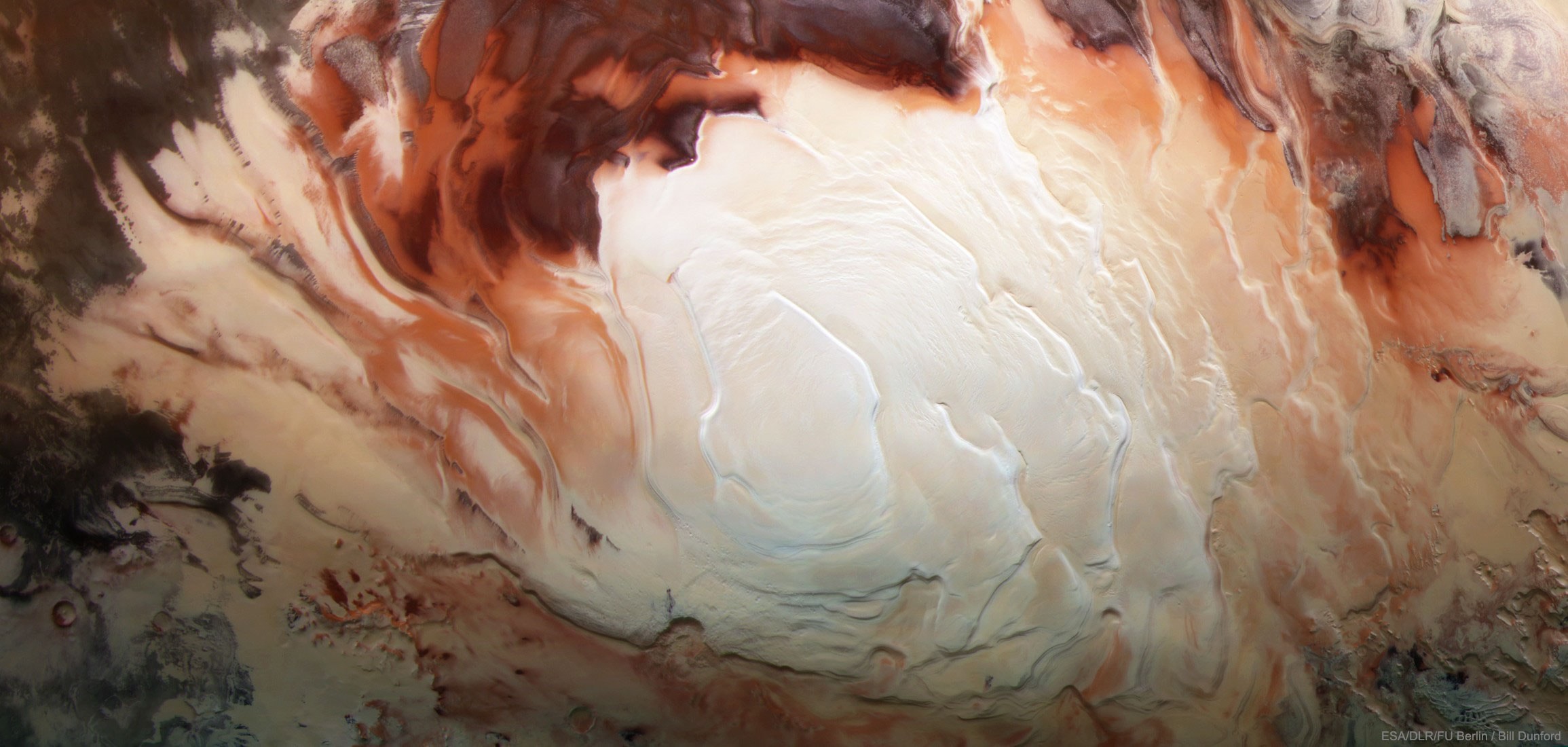 What lies beneath the layered south pole of Mars? A recent measurement with ground-penetrating radar from ESA's Mars Express satellite has detected a bright reflection layer consistent with an underground lake of salty water. The reflection comes from about 1.5 kilometers down and covers an area 20 kilometers across. Liquid water evaporates quickly from the surface of Mars, but a briny confined lake, such as implied by the radar reflection, could last much longer and be a candidate to host life such as microbes. Pictured, an infrared, green, and blue image of the south pole of Mars taken by Mars Express in 2012 shows a complex mixture of layers of dirt, frozen carbon dioxide, and frozen water.