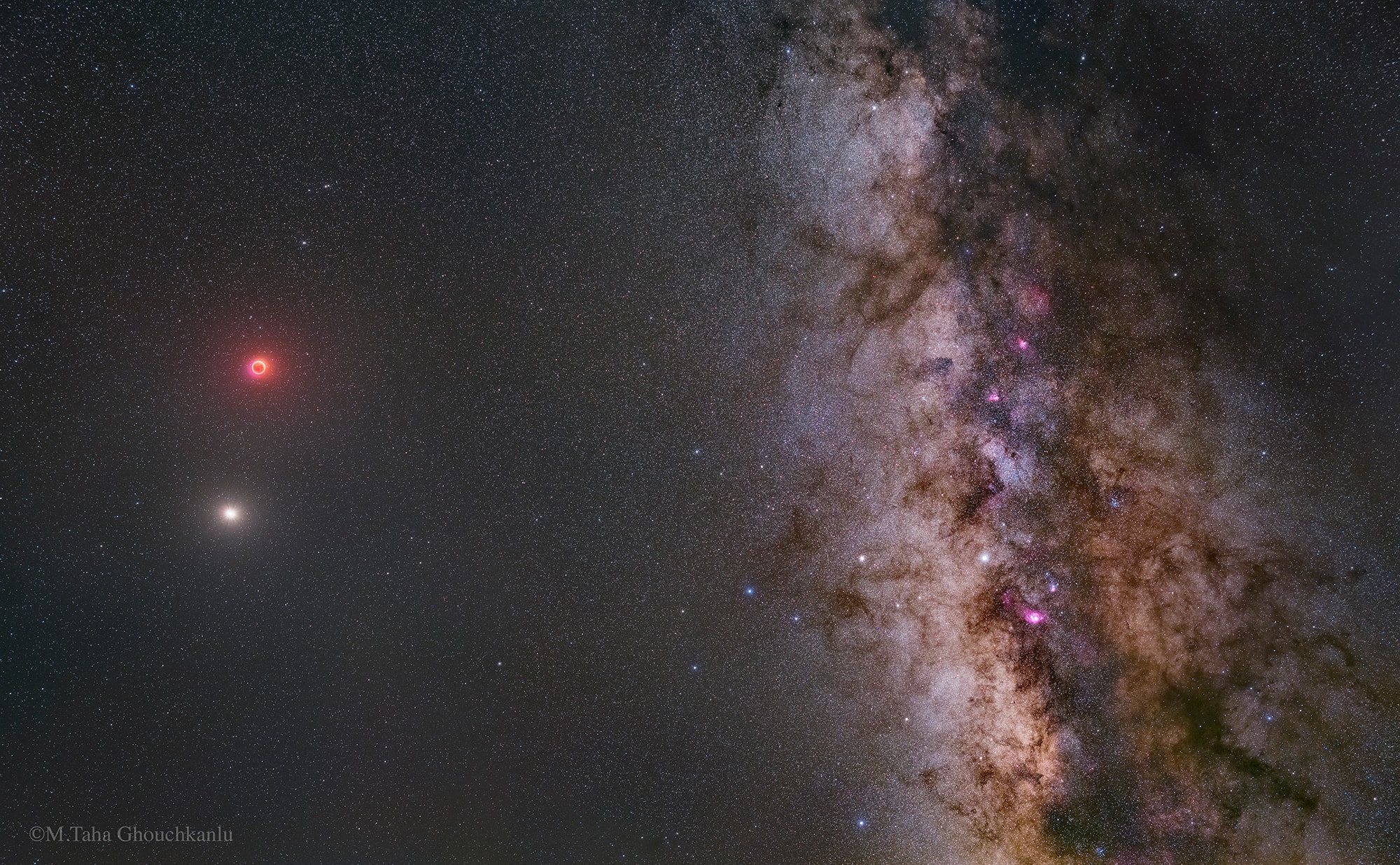 Just two weeks ago, dark skies over the desert in northern Iran held this alluring celestial vista. The dramatic digital mosaic finds the Moon and Mars alongside the Milky Way's dusty rifts, stars, and nebulae. Captured through a series of exposures to cover a range in brightness, that night's otherwise Full Moon is immersed in Earth's shadow. It actually appears fainter and redder than the Red Planet itself during the widely watched total lunar eclipse. For cosmic tourists, the skyscape also includes the Lagoon (M8) and Trifid (M20) nebulae and planet Saturn shining against the Milky Way's pale starlight. The Moon isn't quite done with its shadow play, though. Today, the New Moon partially eclipses the Sun for much of northern planet Earth.