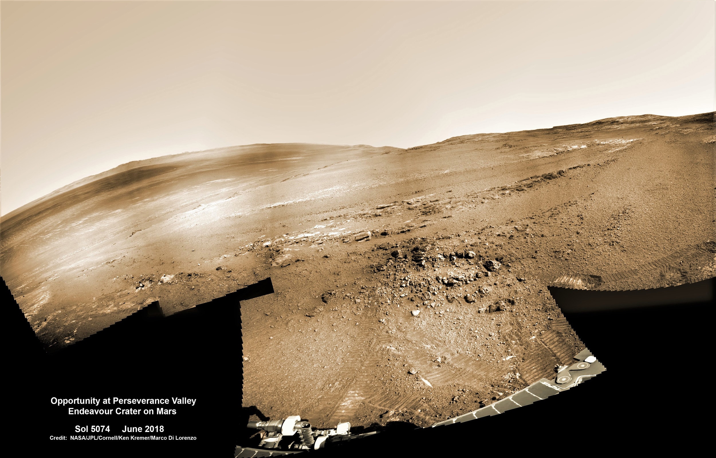 Opportunity had already reached Perseverance Valley by June of 2018. Its view is reconstructed in a colorized mosaic of images taken by the Mars Exploration Rover's Navcam. In fact, Perseverance Valley is an appropriate name for the destination. Designed for a 90 day mission, Opportunity had traveled across Mars for over 5,000 sols (martian solar days) following a January 2004 landing in Eagle crater. Covering a total distance of over 45 kilometers (28 miles), its intrepid journey of exploration across the Martian landscape has come to a close here. On June 10, 2018, the last transmission from the solar-powered rover was received as a dust storm engulfed the Red Planet. Though the storm has subsided, eight months of attempts to contact Opportunity have not been successful and its trailblazing mission ended after almost 15 years of exploring the surface of Mars.