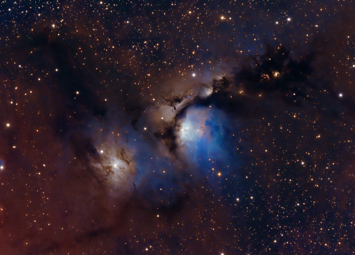 Interstellar dust clouds and bright nebulae abound in the fertile constellation of Orion. One of the brightest, M78, is near the center in this colorful telescopic view, covering an area north of Orion's belt. At a distance of about 1,500 light-years, the bluish nebula itself is about 5 light-years across. Its blue tint is due to dust preferentially reflecting the blue light of hot, young stars in the region. Dark dust lanes and other nebulae can easily be traced through the gorgeous skyscape that includes many Herbig- Haro objects, energetic jets from stars in the process of formation. But missing from this image is McNeil's nebula. A major discovery only recognized in 2004, the enigmatic, variable nebula was found along the dark lane of dust above and right of larger M78. McNeil's nebula is associated with a protostar and seen to be sometimes present and sometimes absent in photos of the well-imaged region. McNeil's nebula faded from view late last year and is still absent in this deep image recorded in February 2019.