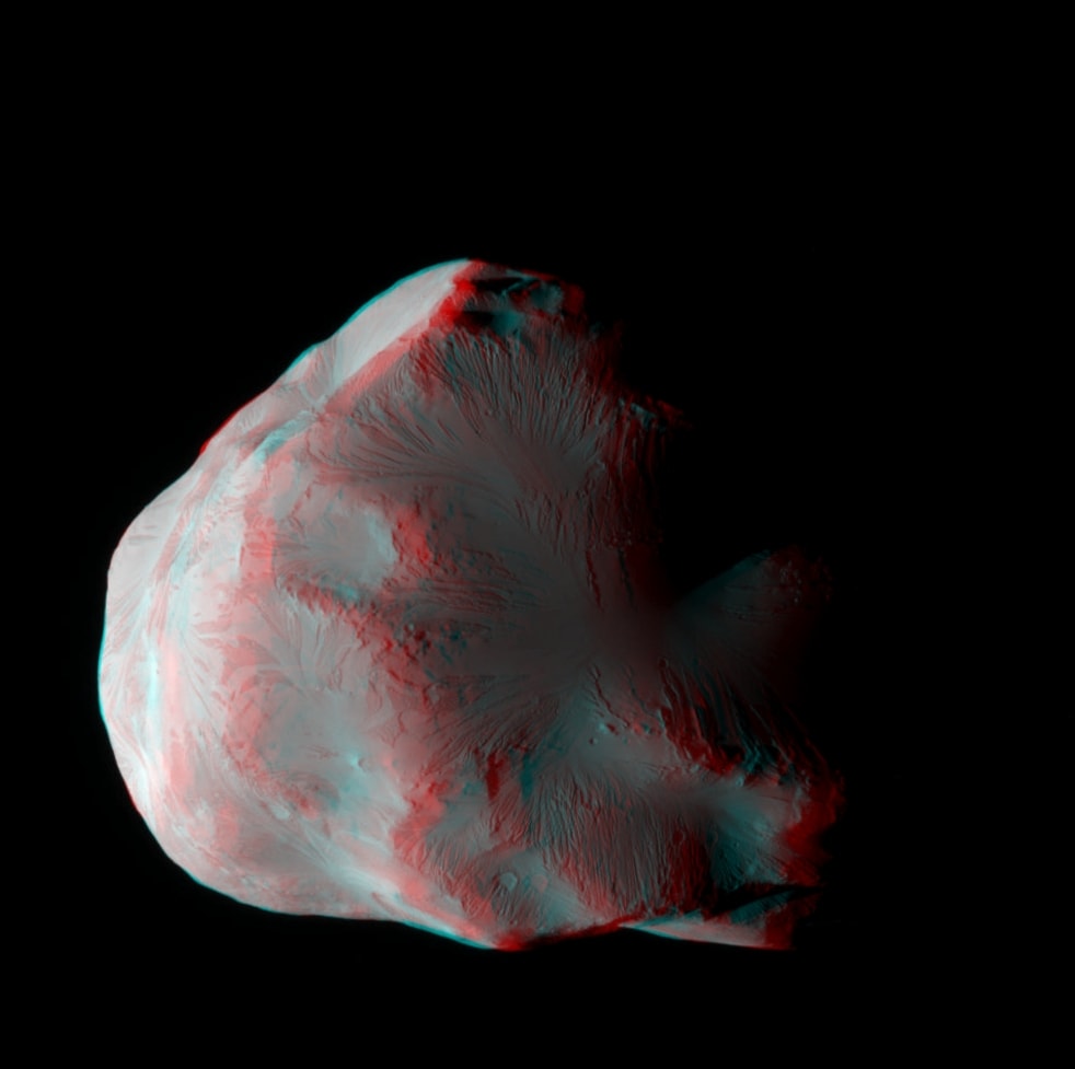Get out your red/blue glasses and float next to Helene, small, icy moon of Saturn. Appropriately named, Helene is one of four known Trojan moons, so called because it orbits at a Lagrange point. A Lagrange point is a gravitationally stable position near two massive bodies, in this case Saturn and larger moon Dione. In fact, irregularly shaped ( about 36 by 32 by 30 kilometers) Helene orbits at Dione's leading Lagrange point while brotherly ice moon Polydeuces follows at Dione's trailing Lagrange point. The sharp stereo anaglyph was constructed from two Cassini images captured during a close flyby in 2011. It shows part of the Saturn-facing hemisphere of Helene mottled with craters and gully-like features.