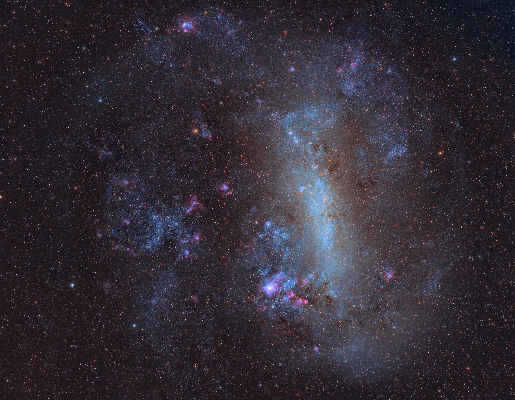 The 16th century Portuguese navigator Ferdinand Magellan and his crew had plenty of time to study the southern sky during the first circumnavigation of planet Earth. As a result, two fuzzy cloud-like objects easily visible to southern hemisphere skygazers are known as the Clouds of Magellan, now understood to be satellite galaxies of our much larger, spiral Milky Way galaxy. About 160,000 light-years distant in the constellation Dorado, the Large Magellanic Cloud (LMC) is seen here in a remarkably deep, colorful, image. Spanning about 15,000 light-years or so, it is the most massive of the Milky Way's satellite galaxies and is the home of the closest supernova in modern times, SN 1987A. The prominent patch below center is 30 Doradus, also known as the magnificent Tarantula Nebula, a giant star-forming region about 1,000 light-years across.