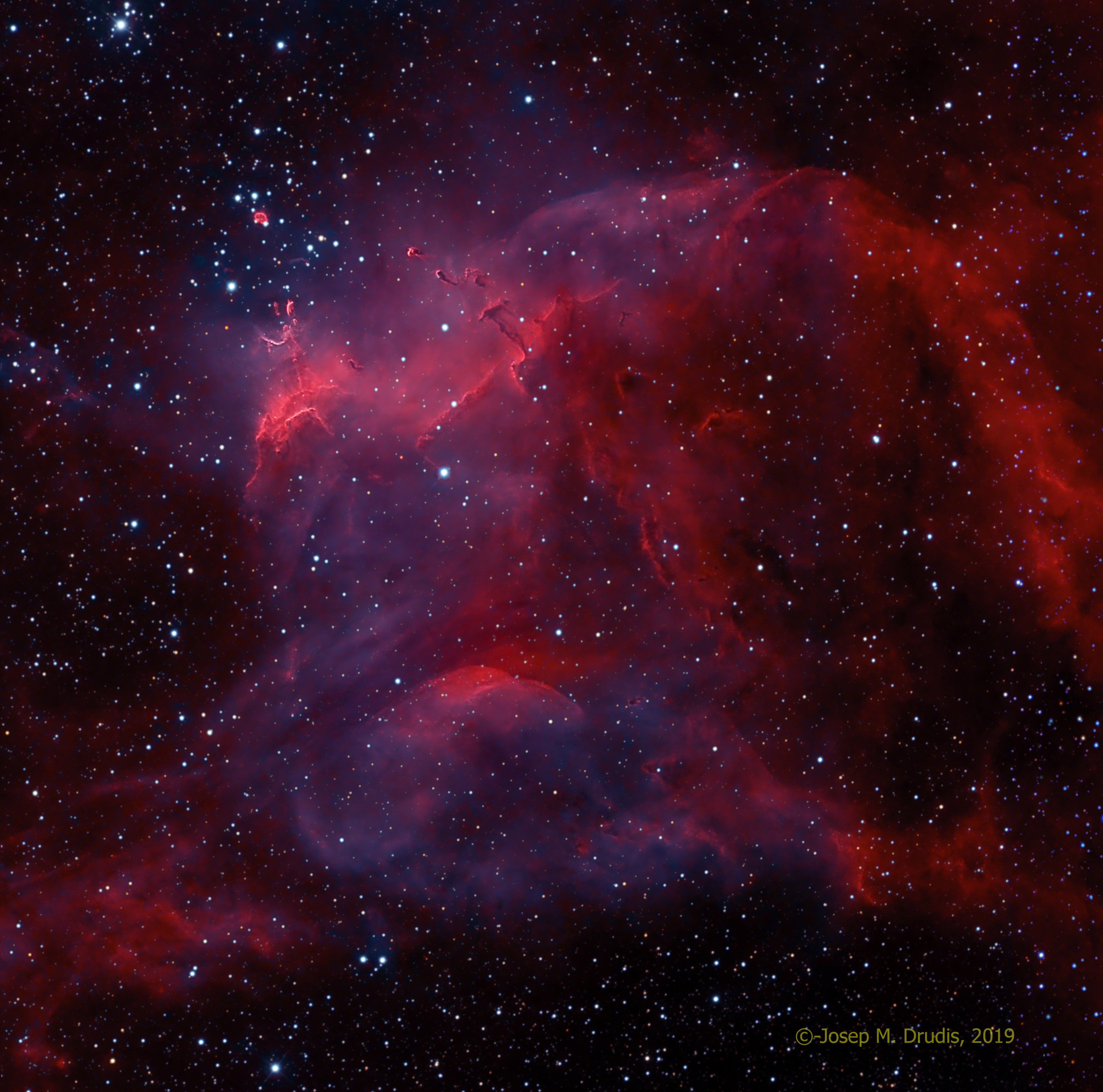 This cosmic skyscape features glowing gas and dark dust clouds along side the young stars of NGC 3572. A beautiful emission nebula and star cluster in far southern skies, the region is often overlooked by astroimagers in favor of its brighter neighbor, the nearby Carina Nebula. Stars from NGC 3572 are toward the upper left in the telescopic frame that would measure about 100 light-years across at the cluster's estimated distant of 9,000 light-years. The visible interstellar gas and dust is part of the star cluster's natal molecular cloud. Dense streamers of material within the nebula, eroded by stellar winds and radiation, clearly trail away from the energetic young stars. They are likely sites of ongoing star formation with shapes reminiscent of the cosmic Tadpoles of IC 410 better known to northern skygazers. In the coming tens to hundreds of millions of years, gas and stars in the cluster will be dispersed though, by gravitational tides and by violent supernova explosions that end the short lives of the massive cluster stars.