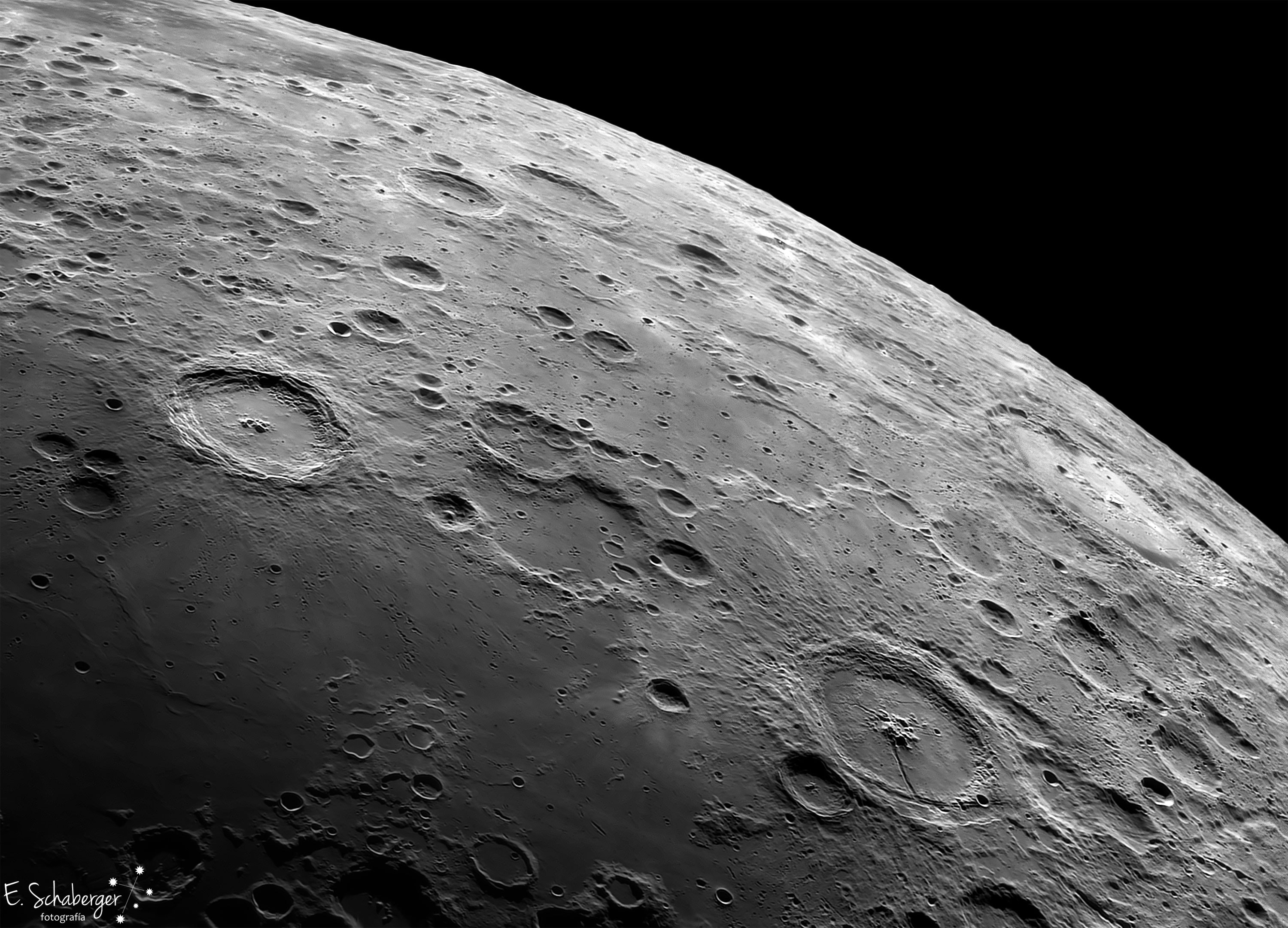 The history of the Moon is partly written in its craters. Pictured here is a lunar panorama taken from Earth featuring the large craters Langrenus, toward the left, and Petavius, toward the right. The craters formed in separate impacts. Langrenus spans about 130 km, has a terraced rim, and sports a central peak rising about 3 km. Petavius is slightly larger with a 180 km diameter and has a distinctive fracture that runs out from its center. Although it is known that Petravius crater is about 3.9 billion years old, the origin of its large fracture is unknown. The craters are best visible a few days after a new Moon, when shadows most greatly accentuate vertical walls and hills. The featured image is a composite of the best of thousands of high-resolution, infrared, video images taken through a small telescope. Although mountains on Earth will likely erode into soil over a billion years, lunar craters Langrenus and Petavius will likely survive many billions more years, possibly until the Sun expands and engulfs both the Earth and Moon. Watch: the November 11 Transit of Mercury from Earth or from Space.