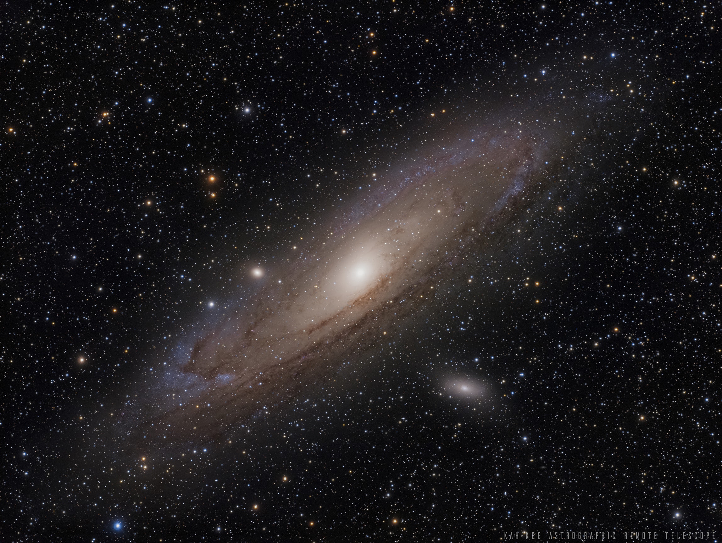 The most distant object easily visible to the unaided eye is M31, the great Andromeda Galaxy some two and a half million light-years away. But without a telescope, even this immense spiral galaxy - spanning over 200,000 light years - appears as a faint, nebulous cloud in the constellation Andromeda. In contrast, a bright yellow nucleus, dark winding dust lanes, expansive blue spiral arms and star clusters are recorded in this stunning telescopic image. While even casual skygazers are now inspired by the knowledge that there are many distant galaxies like M31, astronomers debated this fundamental concept 100 years ago. Were these "spiral nebulae" simply outlying components of our own Milky Way Galaxy or were they instead "island universes", distant systems of stars comparable to the Milky Way itself? This question was central to the famous Shapley-Curtis debate of 1920, which was later resolved by observations of M31 in favor of Andromeda, island universe. Experts Debate: How will humanity first discover extraterrestrial life?