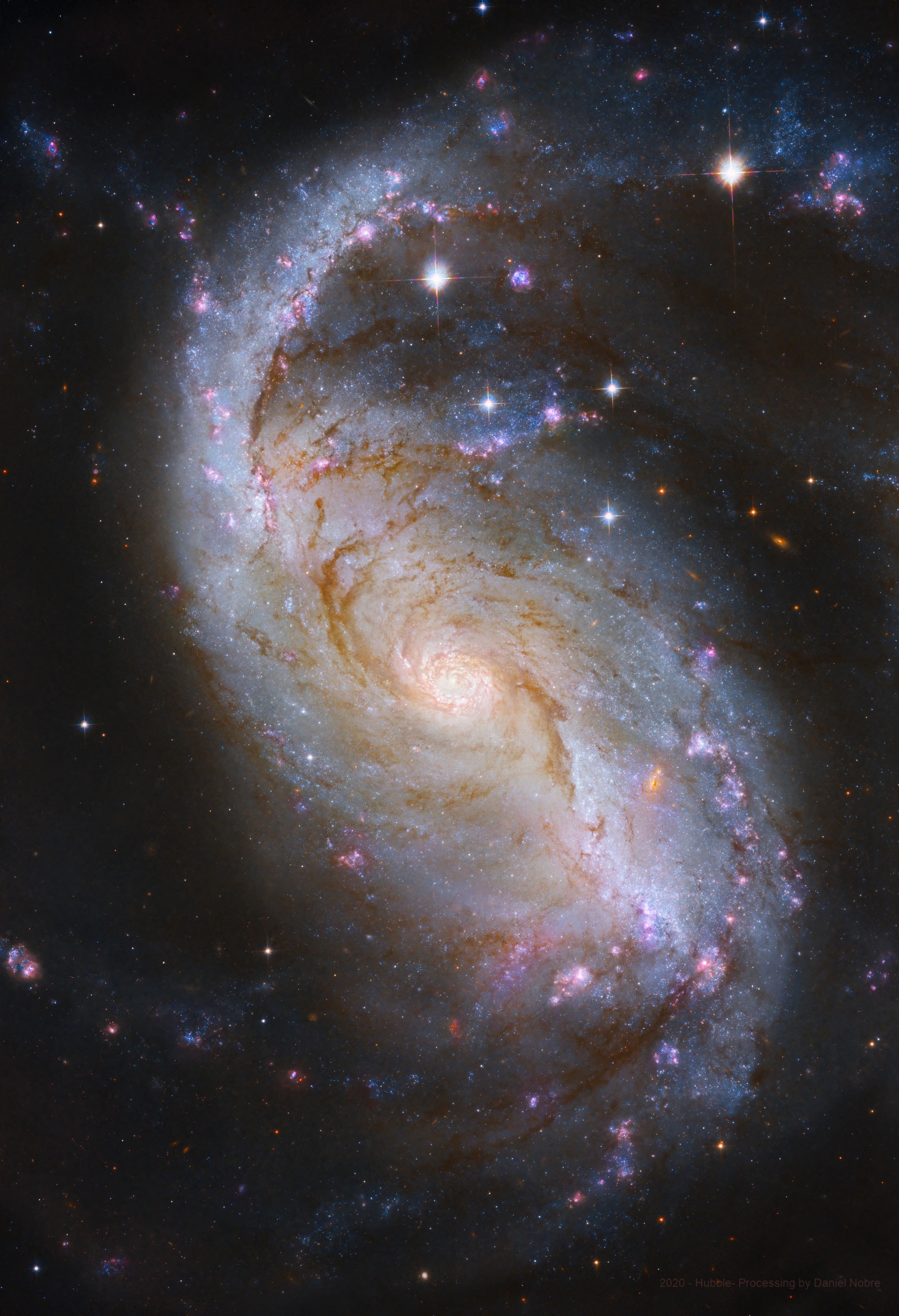 Many spiral galaxies have bars across their centers. Even our own Milky Way Galaxy is thought to have a modest central bar. Prominently barred spiral galaxy NGC 1672, featured here, was captured in spectacular detail in an image taken by the orbiting Hubble Space Telescope. Visible are dark filamentary dust lanes, young clusters of bright blue stars, red emission nebulas of glowing hydrogen gas, a long bright bar of stars across the center, and a bright active nucleus that likely houses a supermassive black hole. Light takes about 60 million years to reach us from NGC 1672, which spans about 75,000 light years across. NGC 1672, which appears toward the constellation of the Dolphinfish (Dorado), has been studied to find out how a spiral bar contributes to star formation in a galaxy's central regions. Notable APOD Submissions: Gallery of Venus passing in front of the Pleiades
