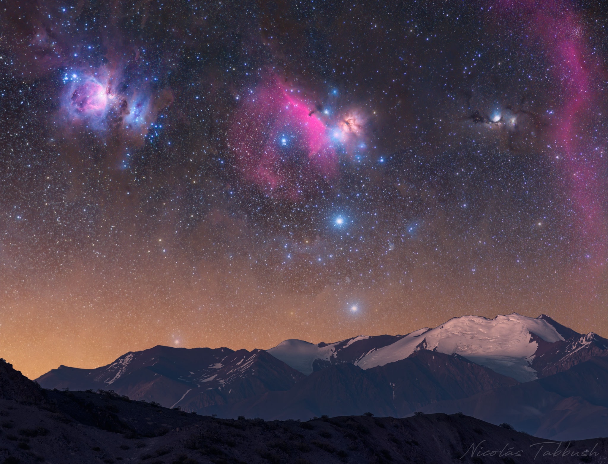 Do you recognize the constellation of Orion? It may be harder than usual in today's featured image because the camera has zoomed in on the center, and the exposure is long enough to enhance nebulas beyond what the unaided human eye can see. Still, once you become oriented, you can see Orion's three belt stars lined up vertically near the image center, and even locate the familiar Orion Nebula on the upper left. Famous faint features that are also visible include the dark Horsehead Nebula indentation near the image center, and the dusty Flame Nebula just to its right. Part of the Orion-encircling Barnard's Loop can also be found on the far right. The image combines multiple sky-tracking shots of the background in different colors with a single static foreground exposure taken at twilight -- all captured with the same camera and from the same location. The picturesque scene was captured early last year from mountains in San Juan, Argentina. Next picture: June 11 < | Archive | Submissions | Index | Search | Calendar | RSS | Education | About APOD | Discuss | > Authors & editors: Robert Nemiroff (MTU) & Jerry Bonnell (UMCP) NASA Official: Phillip Newman Specific rights apply. NASA Web Privacy Policy and Important Notices A service of: ASD at NASA / GSFC & Michigan Tech. U.