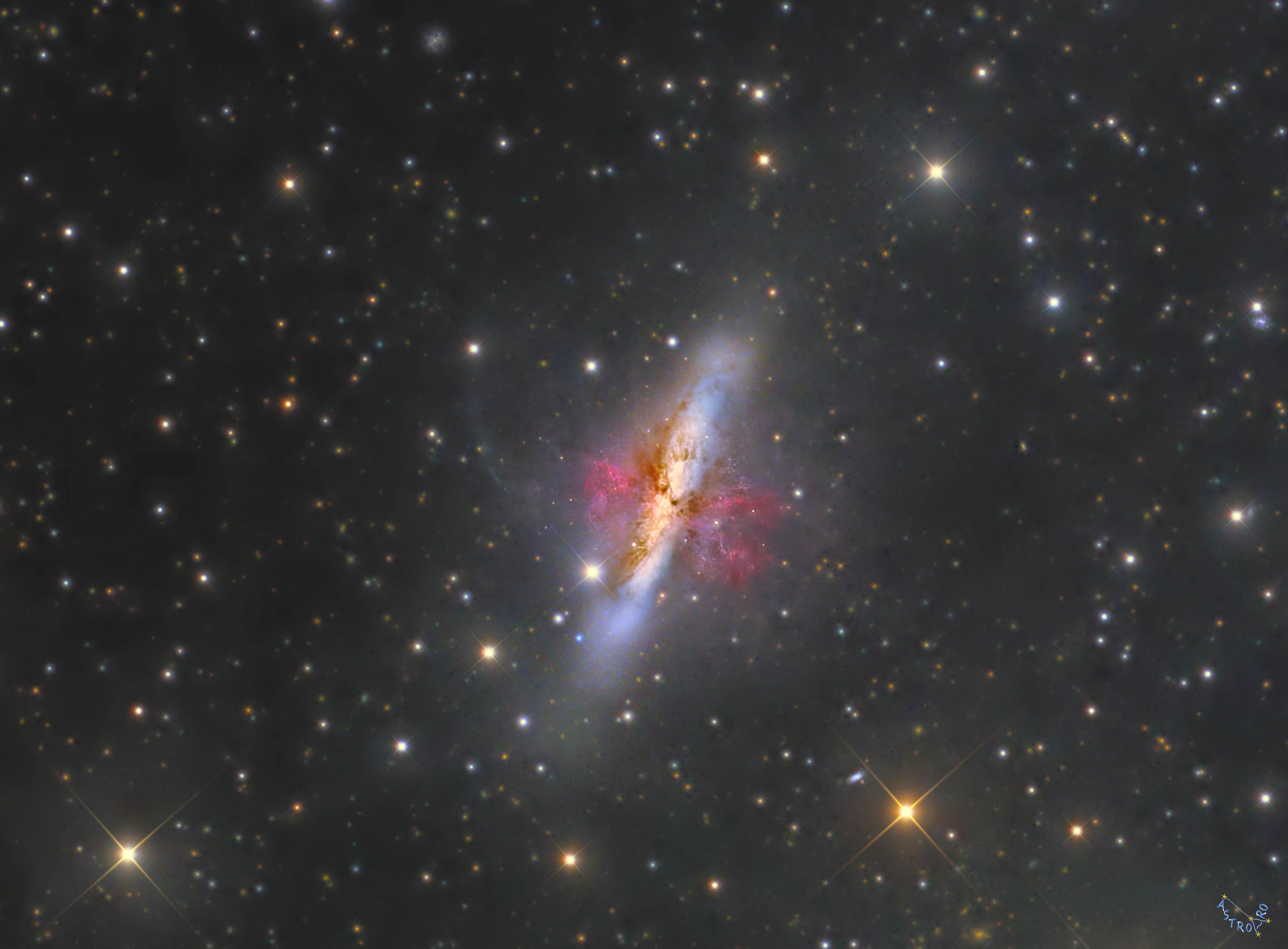 M82 is a starburst galaxy with a superwind. In fact, through ensuing supernova explosions and powerful winds from massive stars, the burst of star formation in M82 is driving a prodigious outflow. Evidence for the superwind from the galaxy's central regions is clear in sharp telescopic snapshot. The composite image highlights emission from long outflow filaments of atomic hydrogen gas in reddish hues. Some of the gas in the superwind, enriched in heavy elements forged in the massive stars, will eventually escape into intergalactic space. Triggered by a close encounter with nearby large galaxy M81, the furious burst of star formation in M82 should last about 100 million years or so. Also known as the Cigar Galaxy for its elongated visual appearance, M82 is about 30,000 light-years across. It lies 12 million light-years away near the northern boundary of Ursa Major.