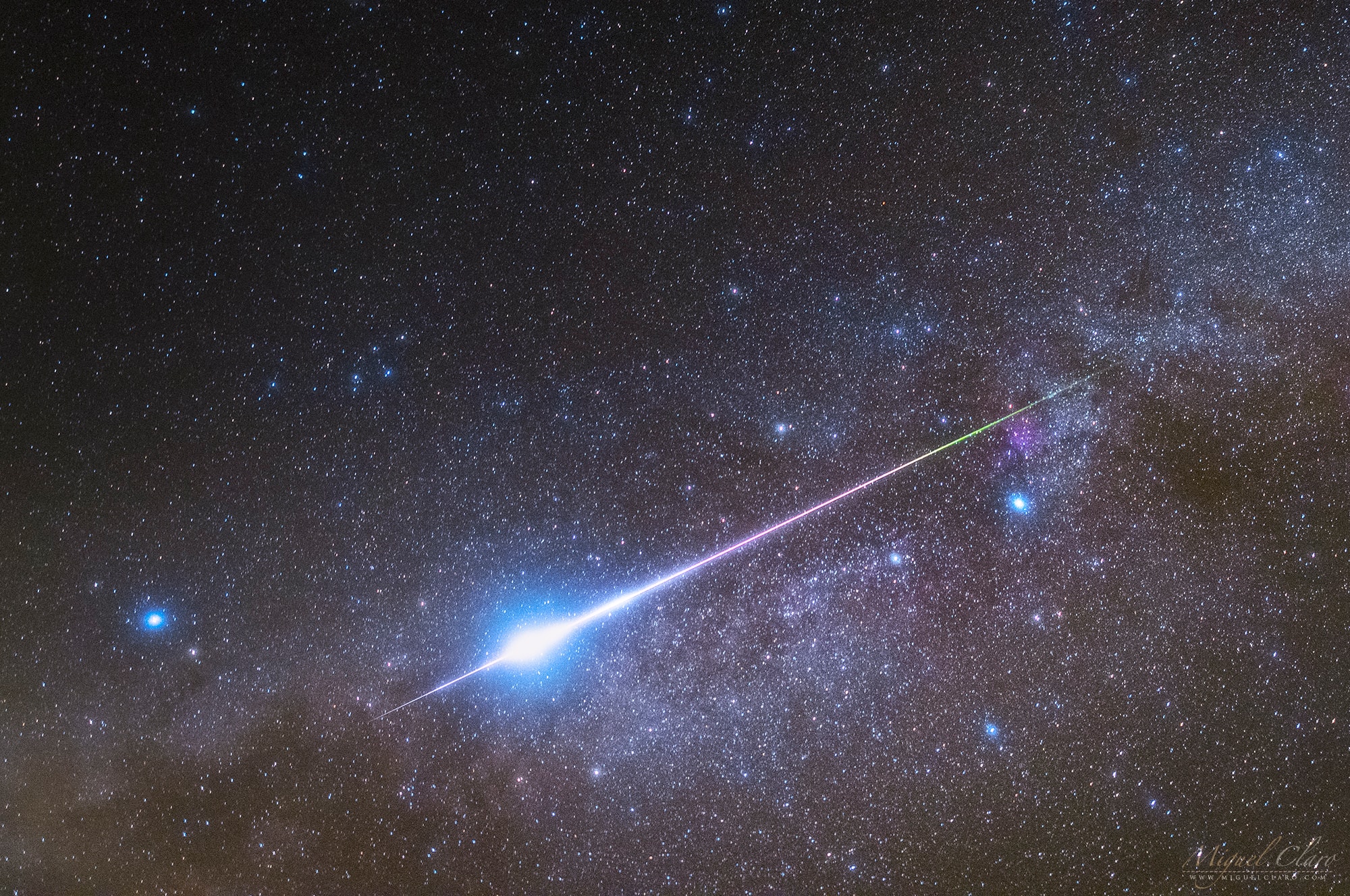 Plowing through Earth's atmosphere at 60 kilometers per second, this bright perseid meteor streaks along a starry Milky Way. Captured in dark Portugal skies on August 12, it moves right to left through the frame. Its colorful trail starts near Deneb (alpha Cygni) and ends near Altair (alpha Aquilae), stars of the northern summer triangle. In fact this perseid meteor very briefly outshines both, two of the brightest stars in planet Earth's night. The trail's initial greenish glow is typical of the bright perseid shower meteors. The grains of cosmic sand, swept up dust from periodic comet Swift-Tuttle, are moving fast enough to excite the characteristic green emission of atomic oxygen at altitudes of 100 kilometers or so before vaporizing in an incandescent flash. Notable APOD Image Submissions: Perseid Meteor Shower 2021