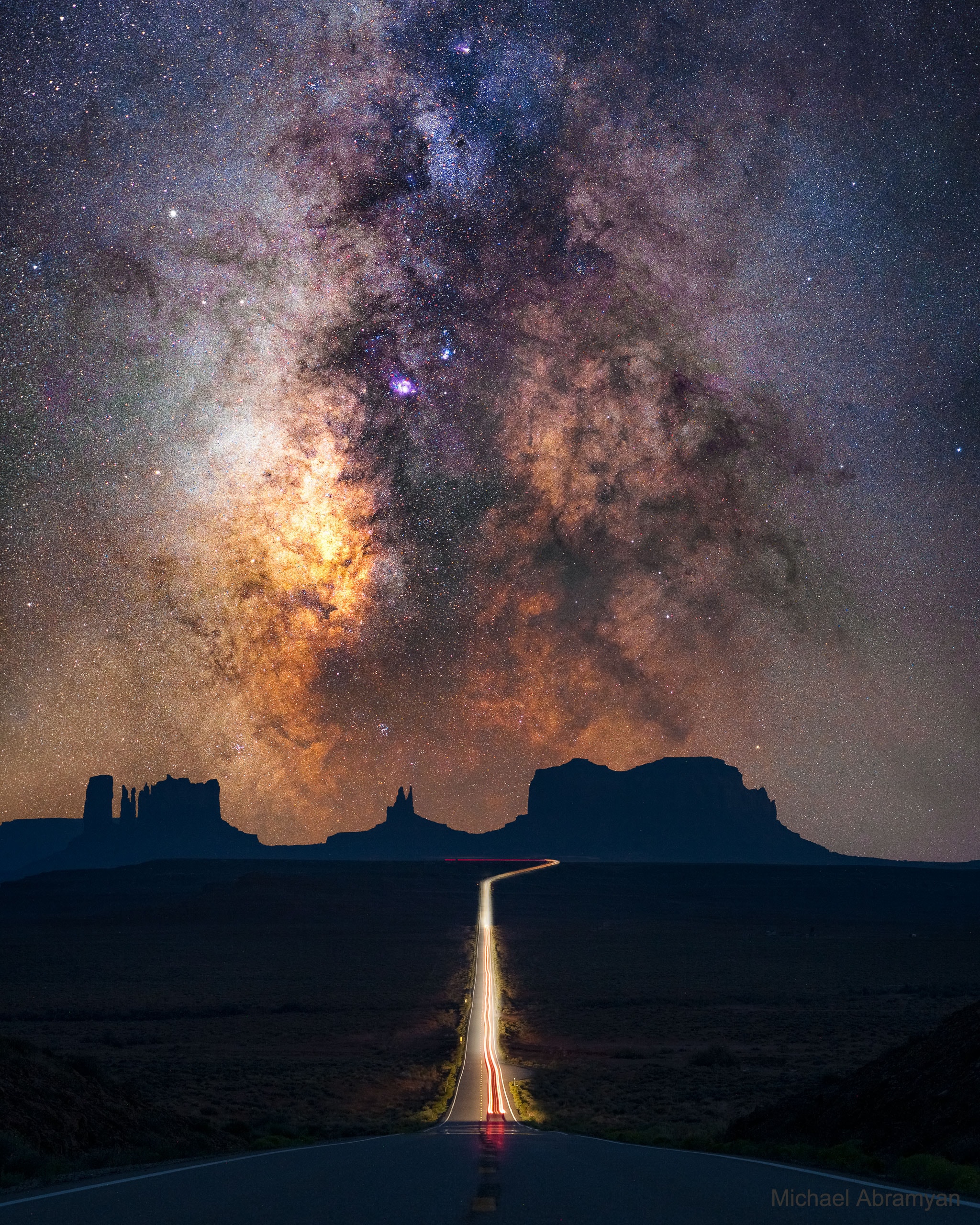 Does the road to our galaxy's center go through Monument Valley? It doesn't have to, but if your road does -- take a picture. In this case, the road is US Route 163 and iconic buttes on the Navajo National Reservation populate the horizon. The band of Milky Way Galaxy stretches down from the sky and appears to be a continuation of the road on Earth. Filaments of dust darken the Milky Way, in contrast to billions of bright stars and several colorful glowing gas clouds including the Lagoon and Trifid nebulas. The featured picture is a composite of images taken with the same camera and from the same location -- Forest Gump Point in Utah, USA. The foreground was taken just after sunset in early September during the blue hour, while the background is a mosaic of four exposures captured a few hours later. Discovery + Outreach: Graduate student research position open for APOD