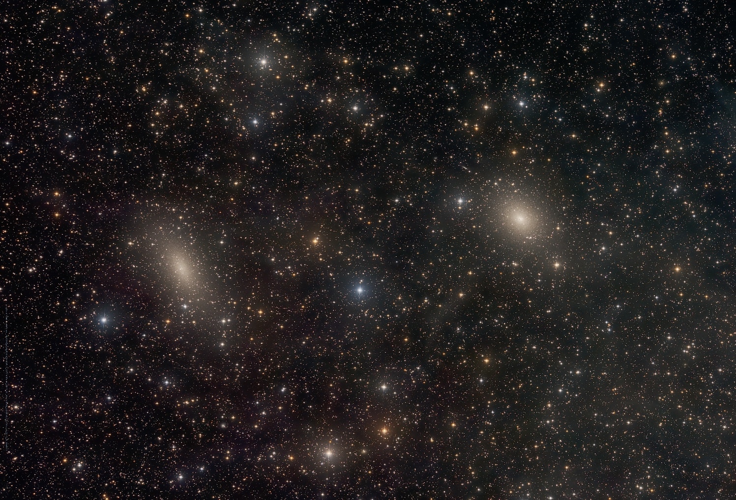 Dwarf galaxies NGC 147 (left) and NGC 185 stand side by side in this sharp telescopic portrait. The two are not-often-imaged satellites of M31, the great spiral Andromeda Galaxy, some 2.5 million light-years away. Their separation on the sky, less than one degree across a pretty field of view, translates to only about 35 thousand light-years at Andromeda's distance, but Andromeda itself is found well outside this frame. Brighter and more famous satellite galaxies of Andromeda, M32 and M110, are seen closer to the great spiral. NGC 147 and NGC 185 have been identified as binary galaxies, forming a gravitationally stable binary system. But recently discovered faint dwarf galaxy Cassiopeia II also seems to be part of their system, forming a gravitationally bound group within Andromeda's intriguing population of small satellite galaxies.